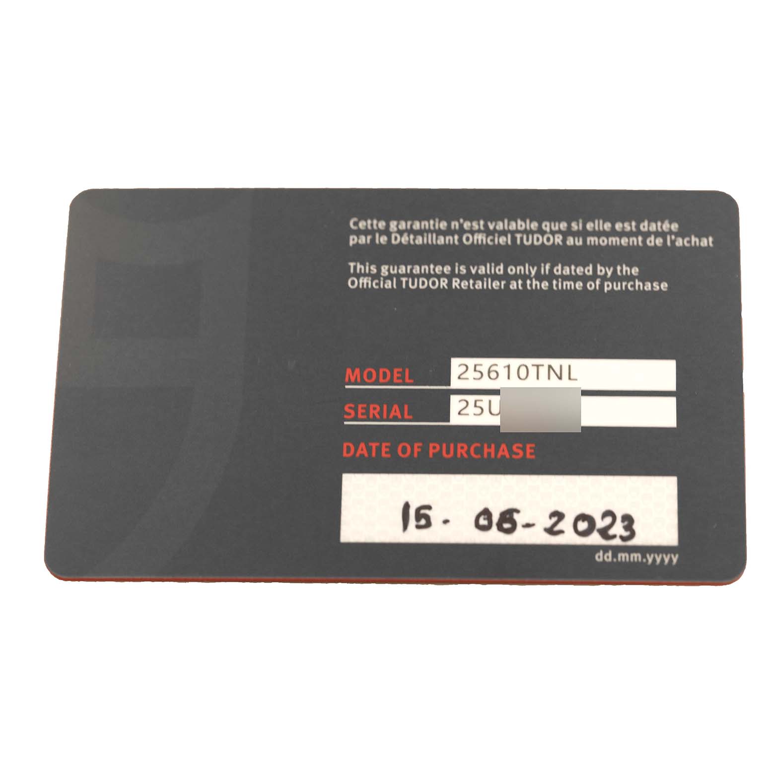 The image shows the warranty card for a Tudor Pelagos 25610TNL Men's Titanium Black Dial 25610TNL Men's Titanium Black Dial model watch with model number 25610TNL.