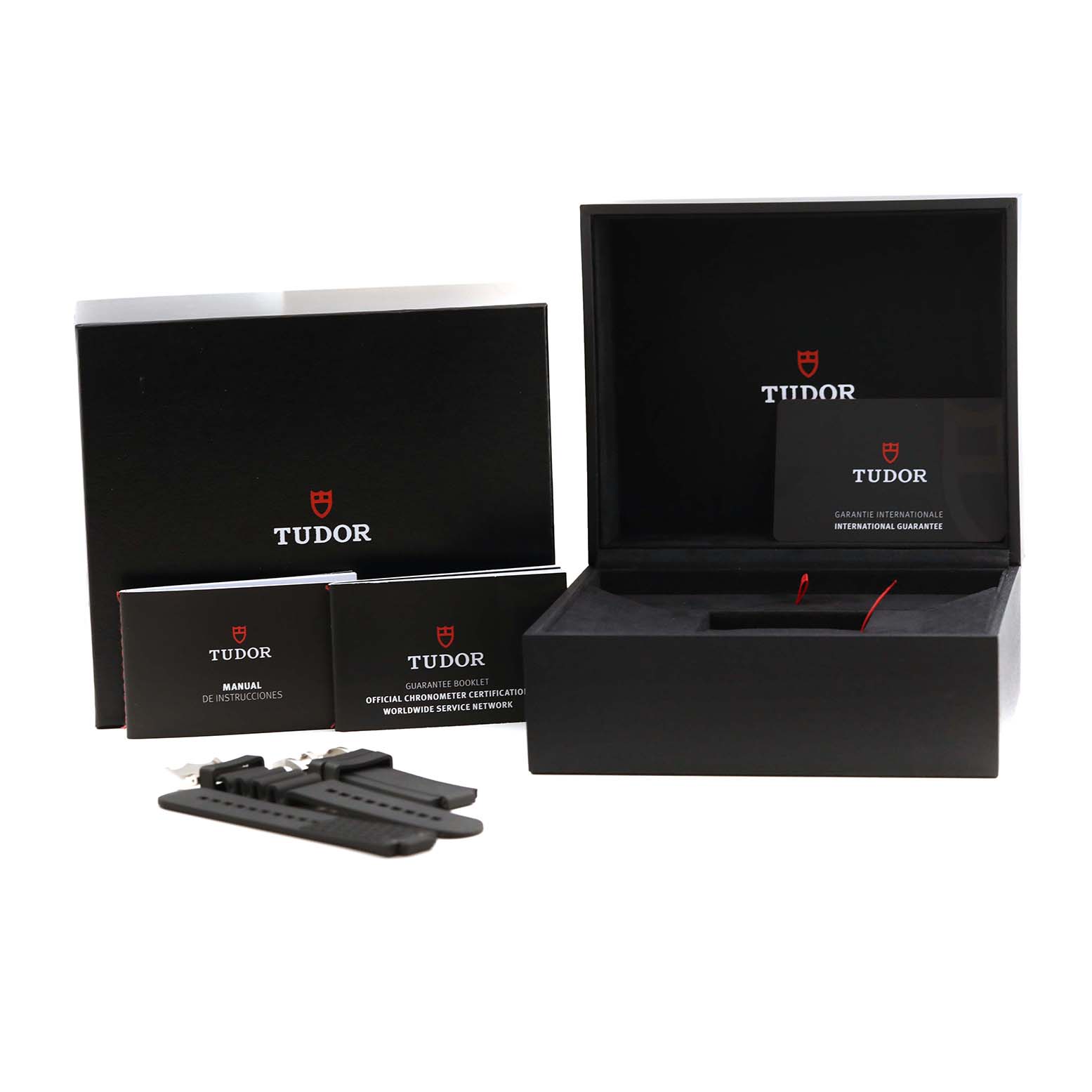 The Tudor Pelagos 25610TNL Men's Titanium Black Dial 25610TNL Men's Titanium Black Dial watch accessories include an open box, manuals, and additional black straps.