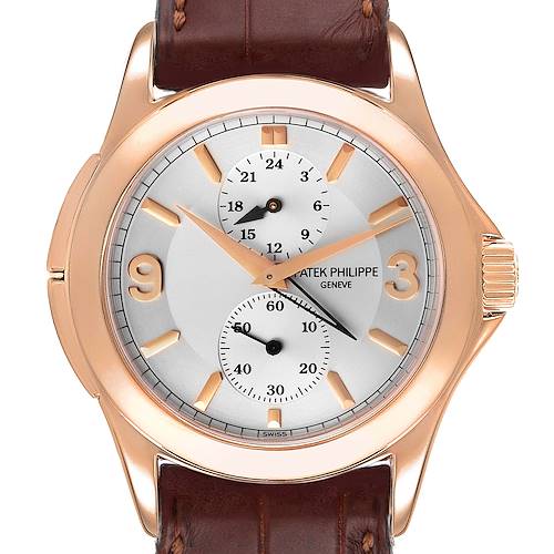 The image shows a front view of a Patek Philippe Calatrava 5134R Men's Rose Gold Silver Dial 5134R Men's Rose Gold Silver Dial watch, highlighting its dial, subdials, and leather strap.