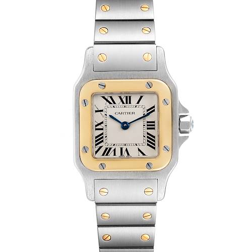 The image shows a front view of a Cartier Santos W20012C4 Women's Steel and Gold (two tone) Silver Dial W20012C4 Women's Steel and Gold (two tone) Silver Dial watch, displaying its face, bezel, and partially visible metal bracelet.