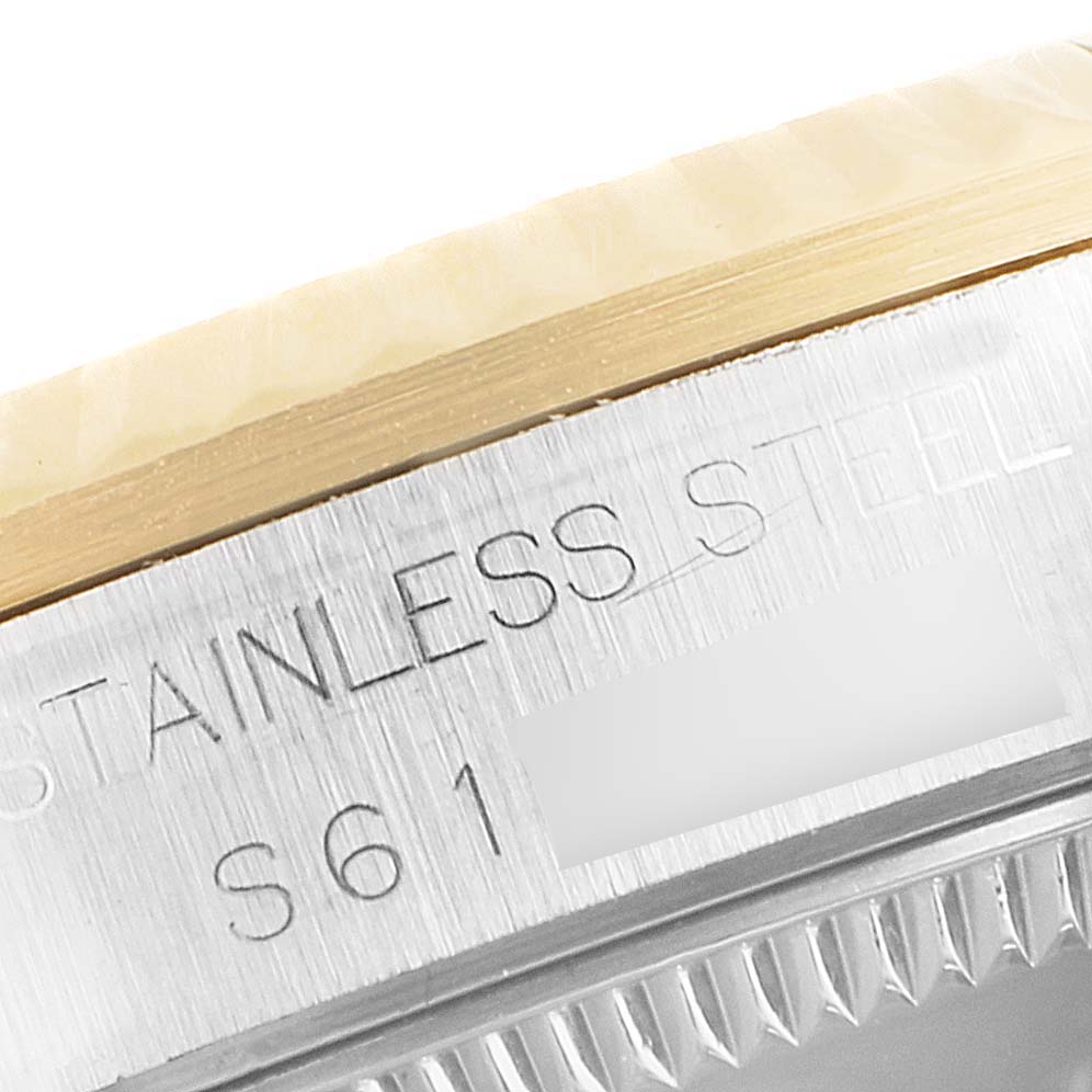 The image shows a close-up side view of the stainless steel and gold bezel of a Rolex Datejust 68273 Women's Steel and Gold (two tone) White Dial 68273 Women's Steel and Gold (two tone) White Dial watch.