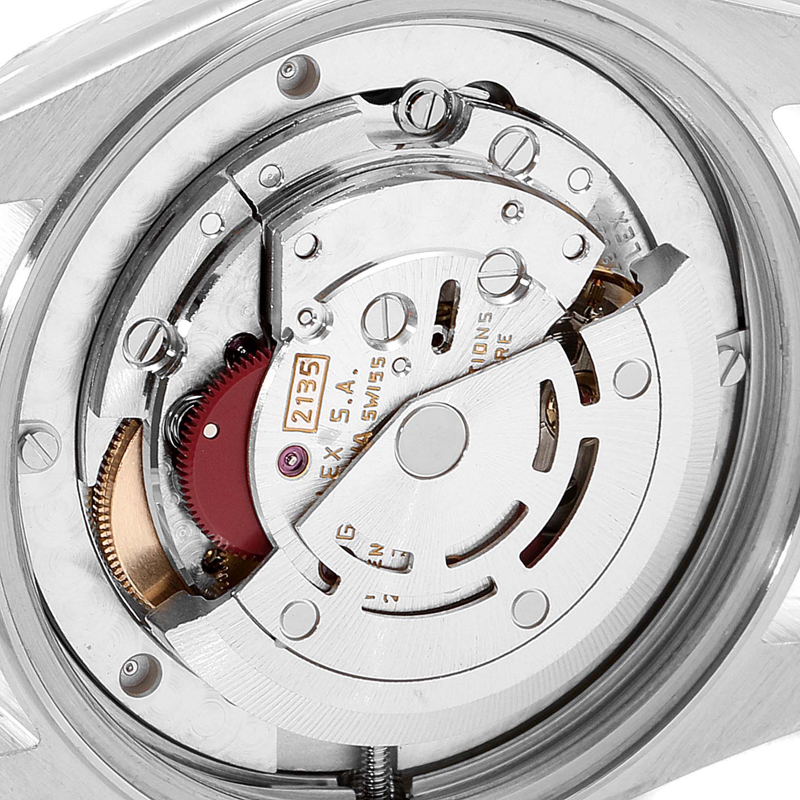 This image shows a close-up view of the movement mechanism inside a Rolex Datejust 68273 Women's Steel and Gold (two tone) White Dial 68273 Women's Steel and Gold (two tone) White Dial watch.