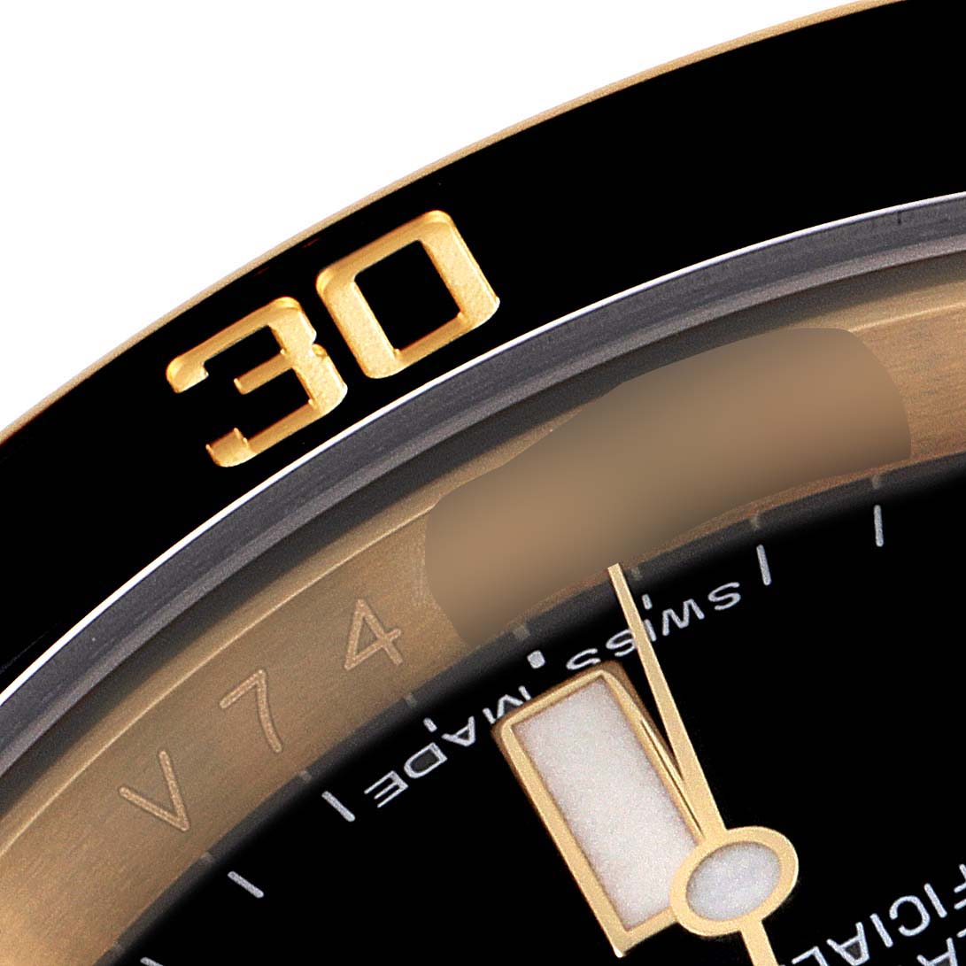 The image shows a close-up of the bezel and partial dial of a Rolex Submariner 116618 Men's Yellow Gold Black Dial 116618 Men's Yellow Gold Black Dial watch, highlighting the number 30 and Swiss Made text.