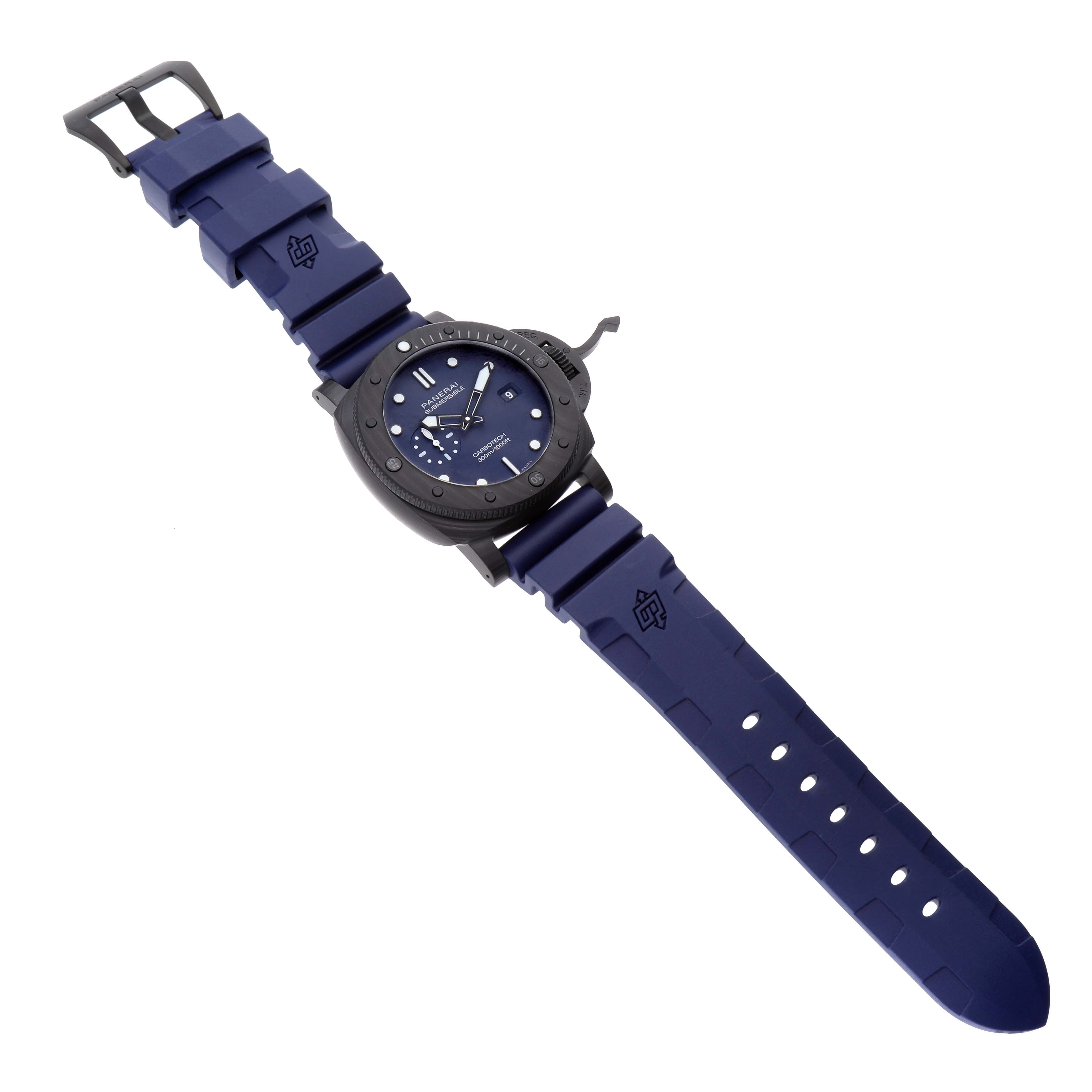 The image shows a Panerai Submersible PAM01232 Men's Titanium Blue Dial PAM01232 Men's Titanium Blue Dial watch with a blue rubber strap laid flat, revealing the dial and buckle.