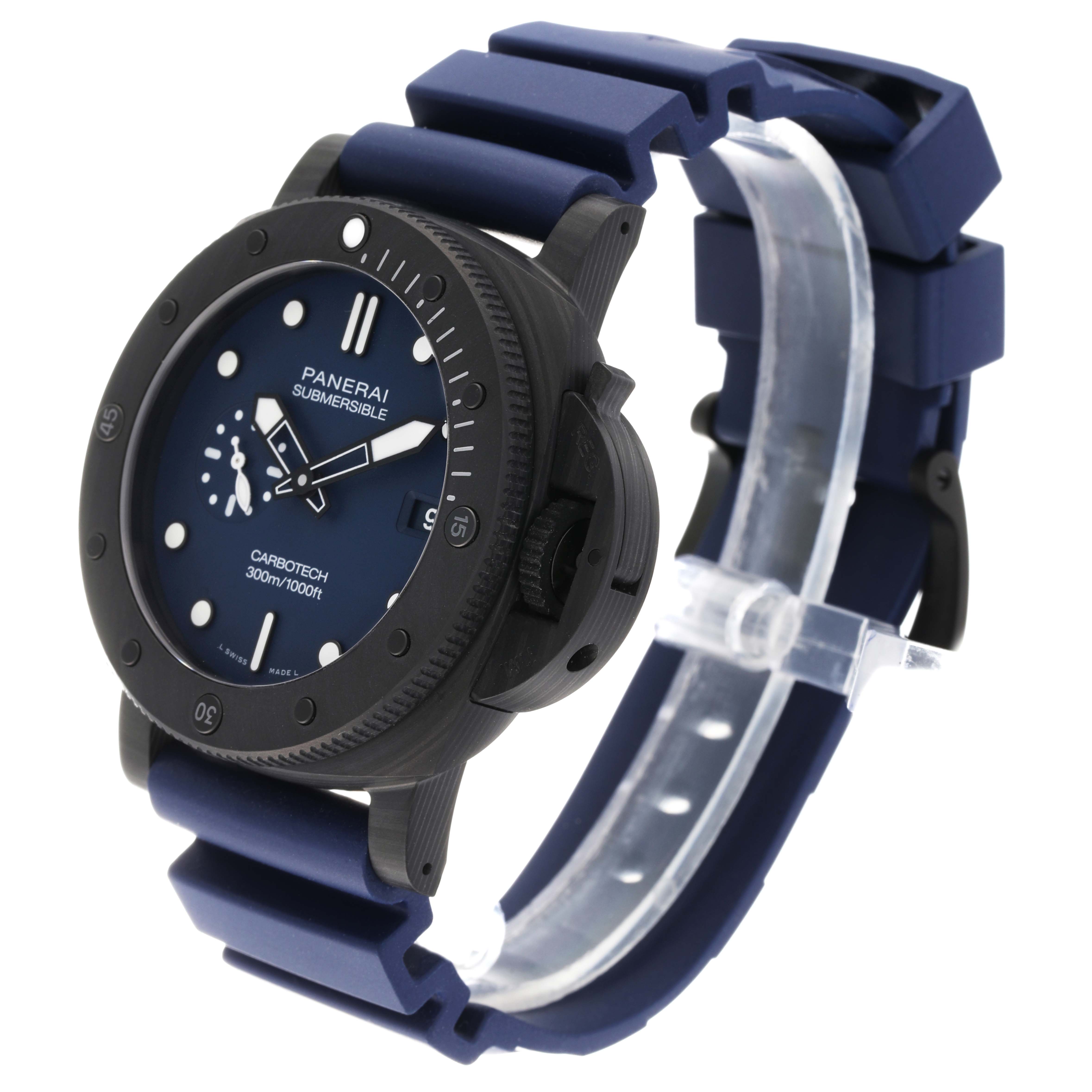 The Panerai Submersible PAM01232 Men's Titanium Blue Dial PAM01232 Men's Titanium Blue Dial watch is shown at an angle displaying its face, bezel, and blue rubber strap.