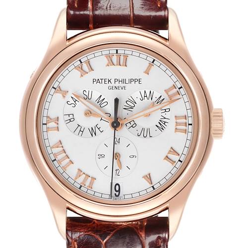 The Patek Philippe Complications 5035R-001 Men's Rose Gold Silver Dial 5035R-001 Men's Rose Gold Silver Dial watch is shown from the front, displaying the dial, hands, subdials, and leather strap.