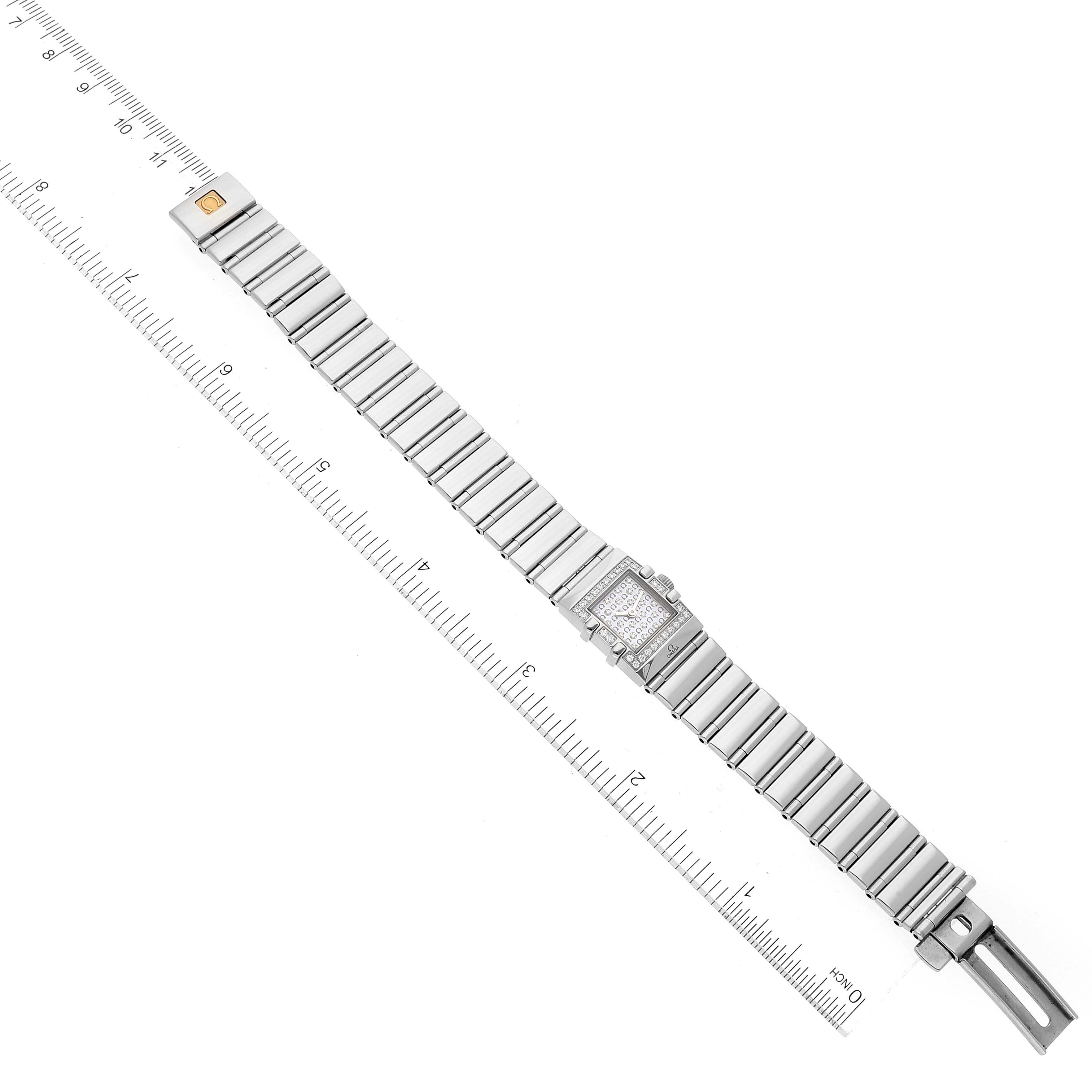 The Omega 1539.77.00 Women's Stainless Steel Mother of Pearl Dial 1539.77.00 Women's Stainless Steel Mother of Pearl Dial Constellation Quadra MOP Diamond Steel Ladies Watch 1539.77.00 is shown fully extended with a ruler for scale.