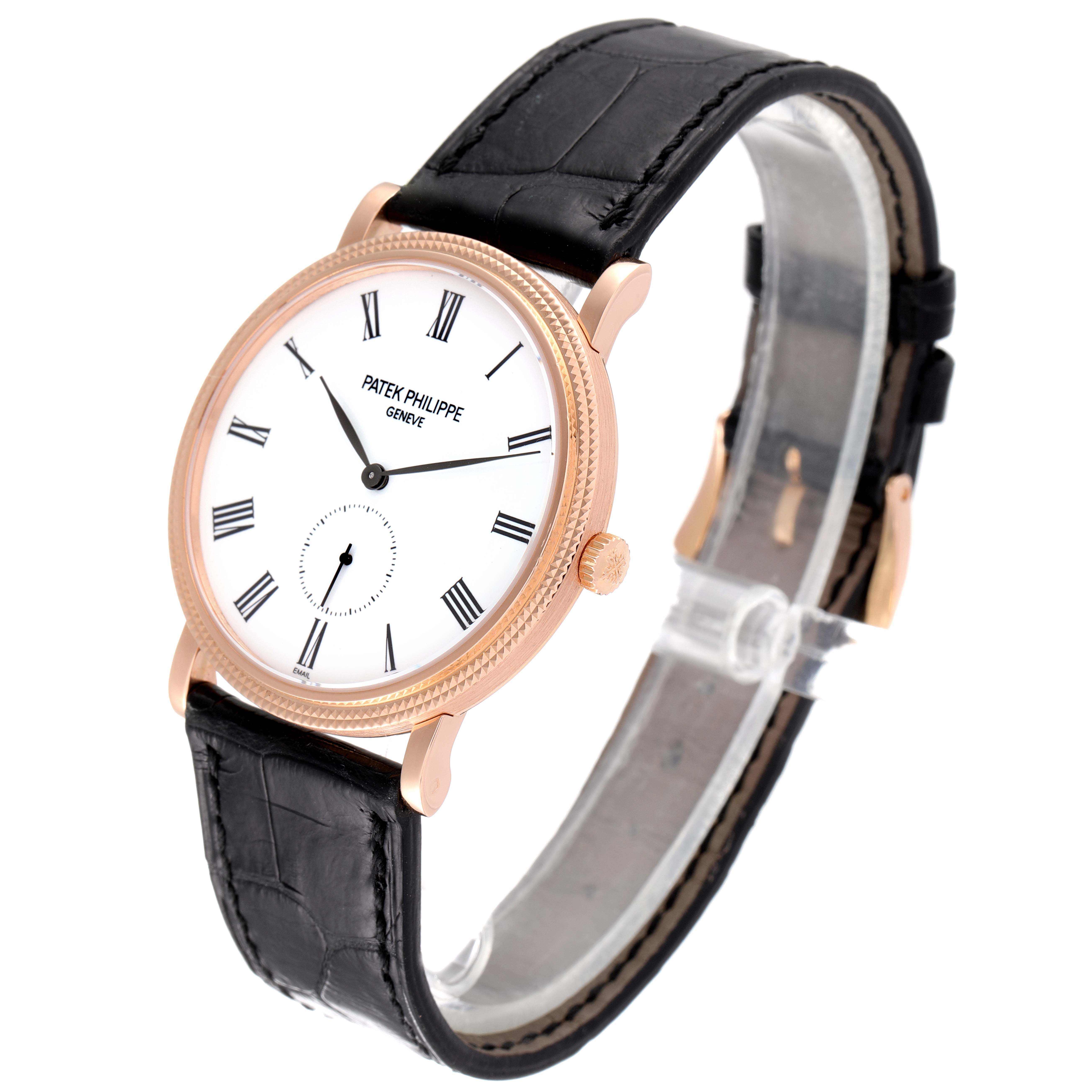 This image shows a Patek Philippe Calatrava 5116R Men's Rose Gold White Dial 5116R Men's Rose Gold White Dial watch from an angled side view, highlighting its dial, hands, and leather strap.