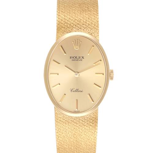 The image shows a front view of a Rolex Cellini 4307 Women's Yellow Gold Champagne Dial 4307 Women's Yellow Gold Champagne Dial watch, highlighting its oval face, gold dial, and textured band.