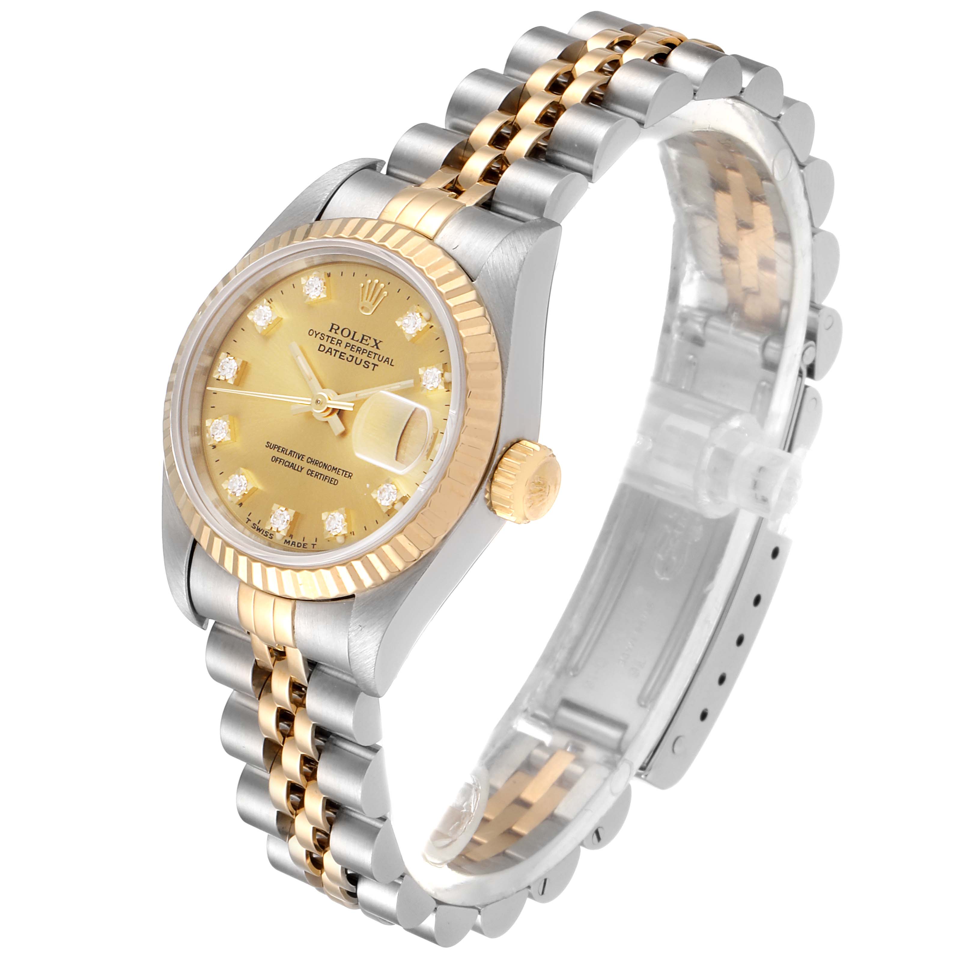 This image shows a Rolex Datejust 69173 Women's Steel and Gold (two tone) Champagne Dial 69173 Women's Steel and Gold (two tone) Champagne Dial watch at a slight angle, highlighting its champagne dial, two-tone bracelet, and fluted bezel.