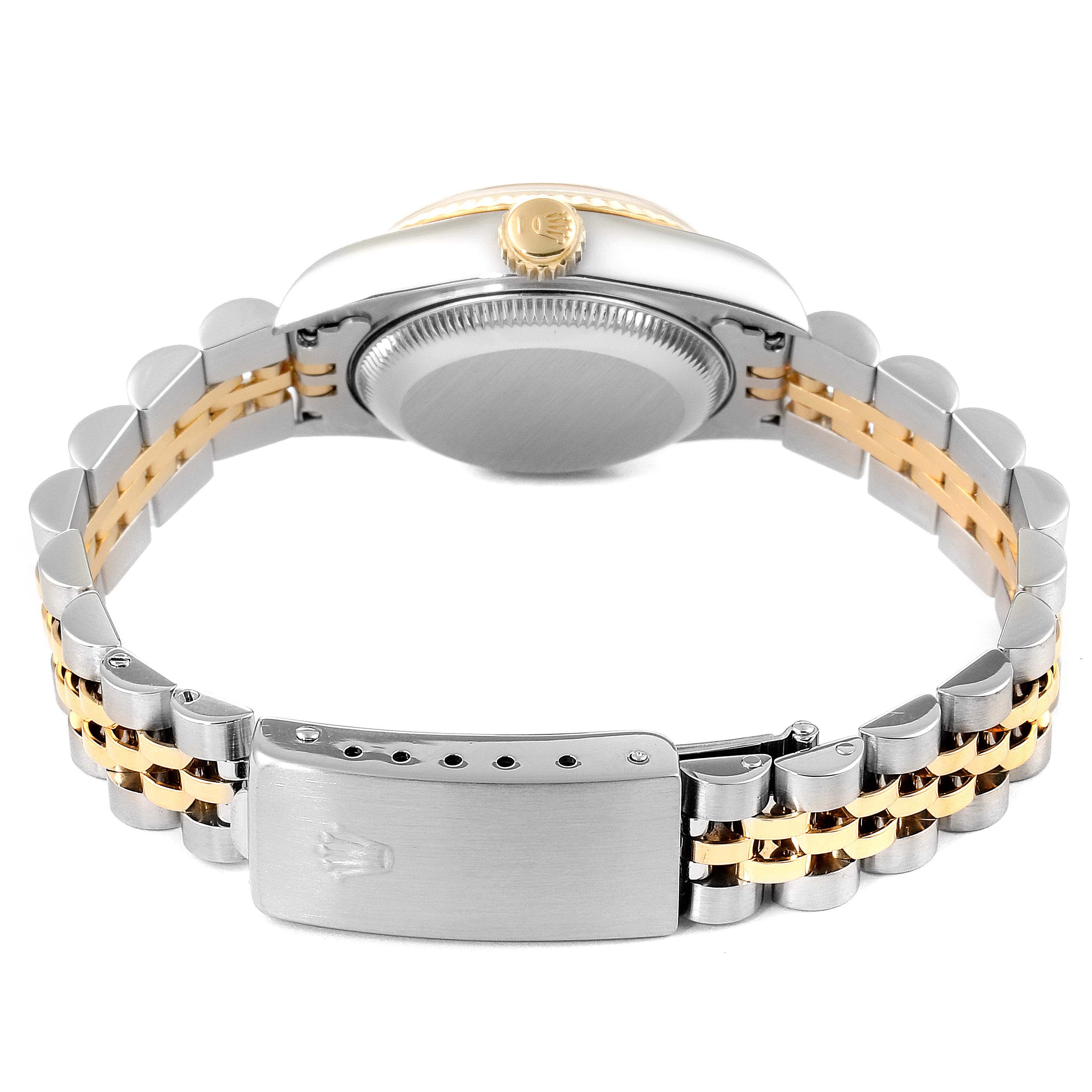 This image shows the back view of the Rolex Datejust 69173 Women's Steel and Gold (two tone) Champagne Dial 69173 Women's Steel and Gold (two tone) Champagne Dial watch, featuring its case, crown, and two-tone bracelet.