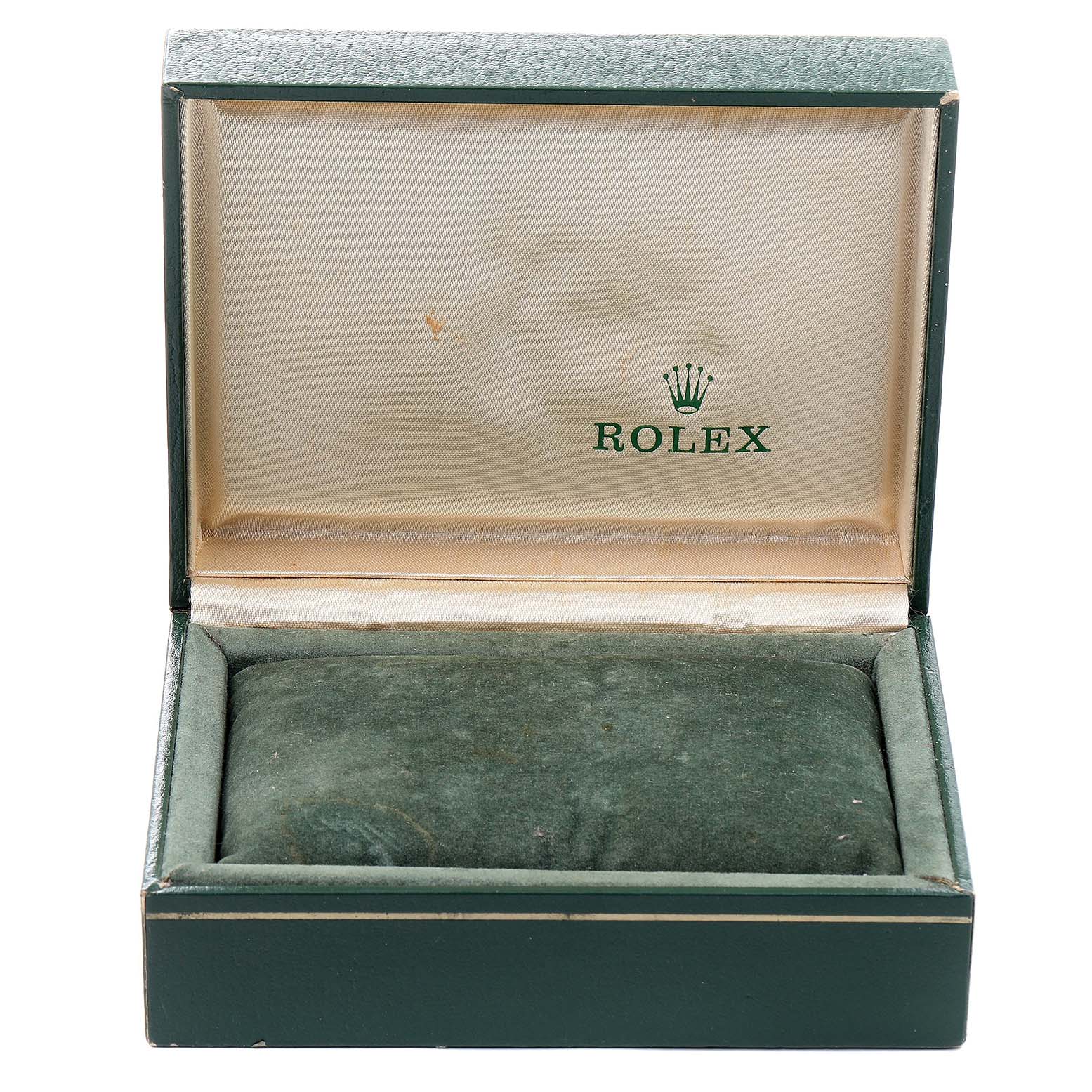 The image shows an open green Rolex Datejust 69173 Women's Steel and Gold (two tone) Champagne Dial 69173 Women's Steel and Gold (two tone) Champagne Dial watch box without the watch, viewed from the front.