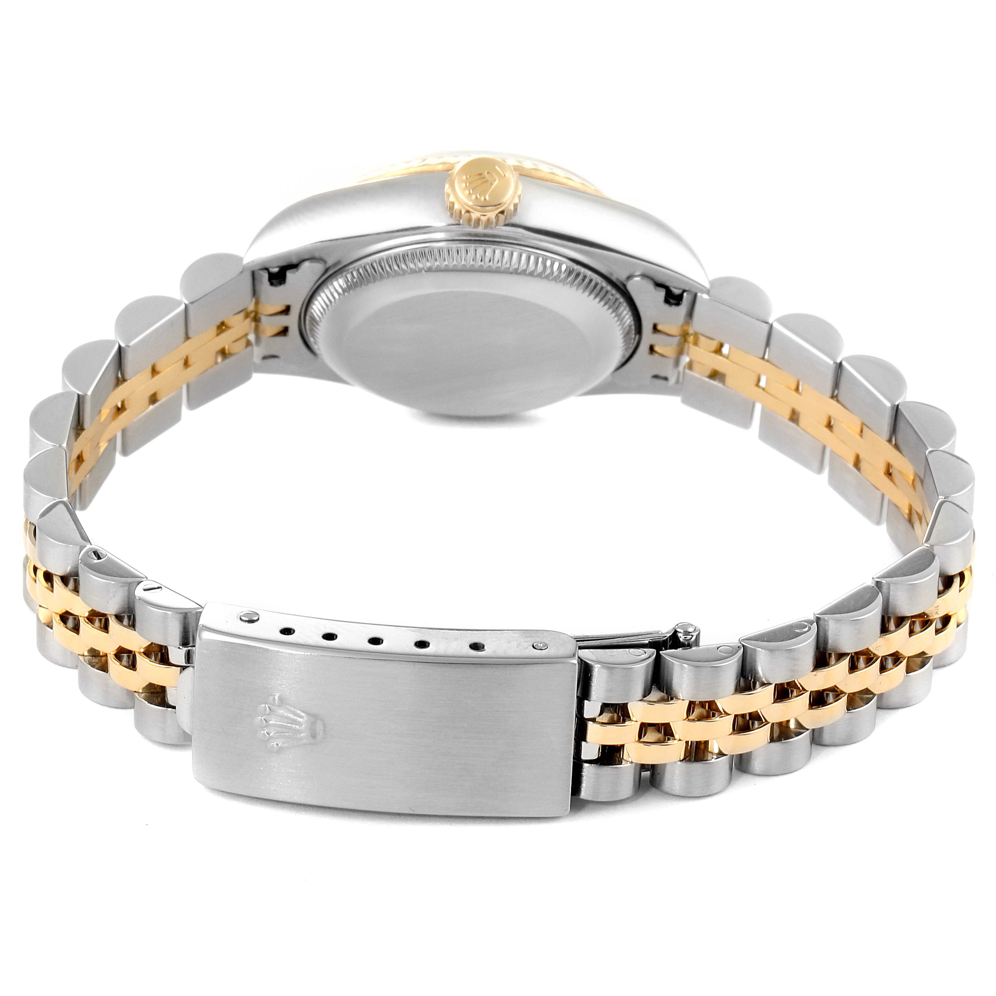 This image shows the back view of a Rolex Datejust 79173 Women's Steel and Gold (two tone) Mother of Pearl Dial 79173 Women's Steel and Gold (two tone) Mother of Pearl Dial watch, focusing on the case back and the two-tone Jubilee bracelet with the clasp.