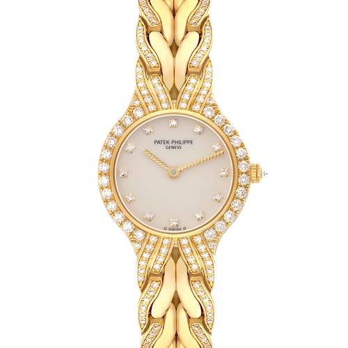 The Patek Philippe La Flamme  4816/3J Women's Yellow Gold Champagne Dial 4816/3J Women's Yellow Gold Champagne Dialwatch is shown from the front, highlighting the round diamond-studded face and ornate bracelet.