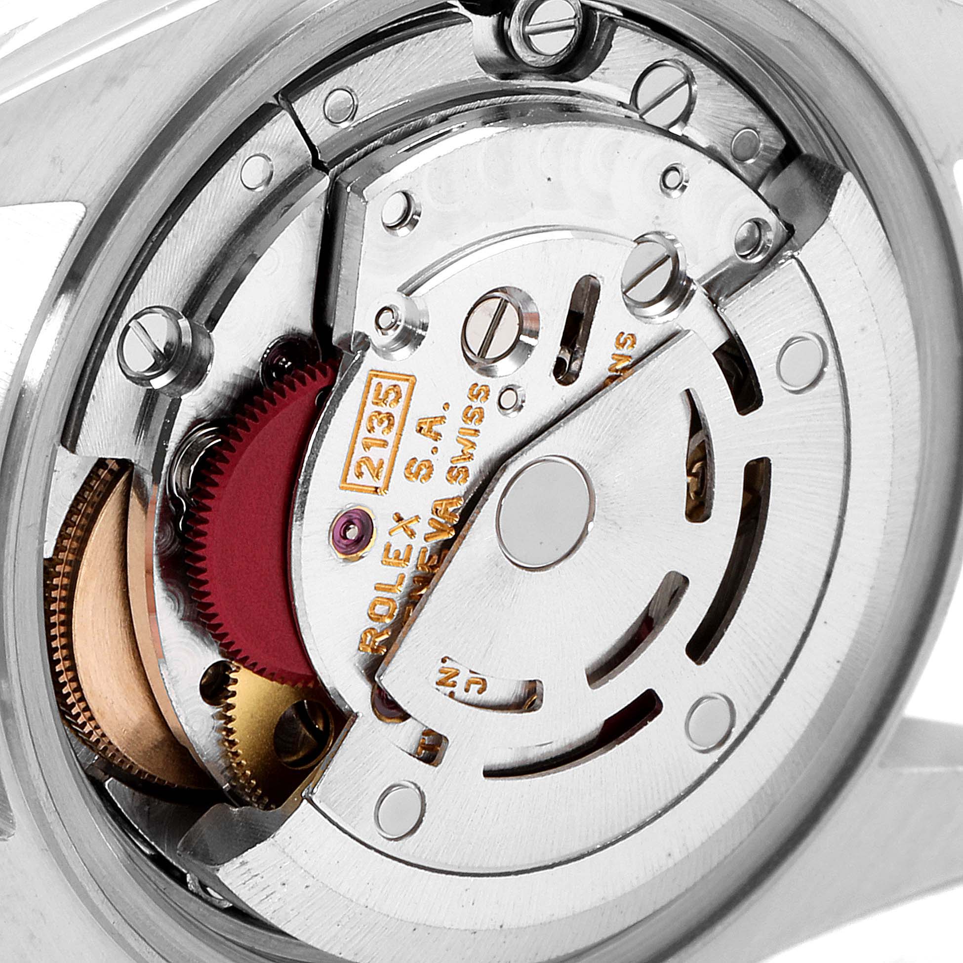 This is a close-up view of the movement inside a Rolex Datejust 69173 Women's Steel and Gold (two tone) Champagne Dial 69173 Women's Steel and Gold (two tone) Champagne Dial watch, showing its intricate machinery and components.