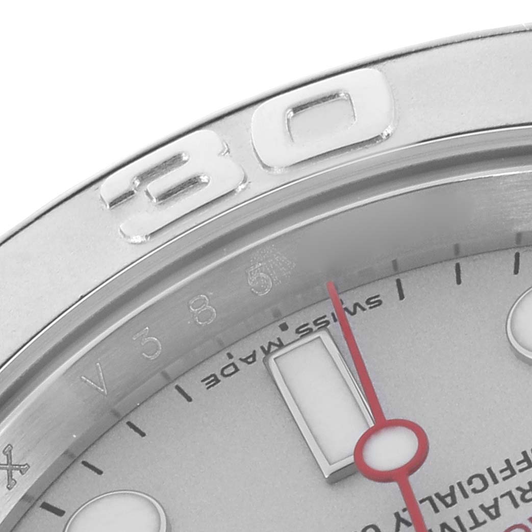 The image shows a close-up of the Rolex Yacht-Master 16622 Men's Stainless Steel Silver Dial 16622 Men's Stainless Steel Silver Dial's bezel, partial dial, and hour markers.