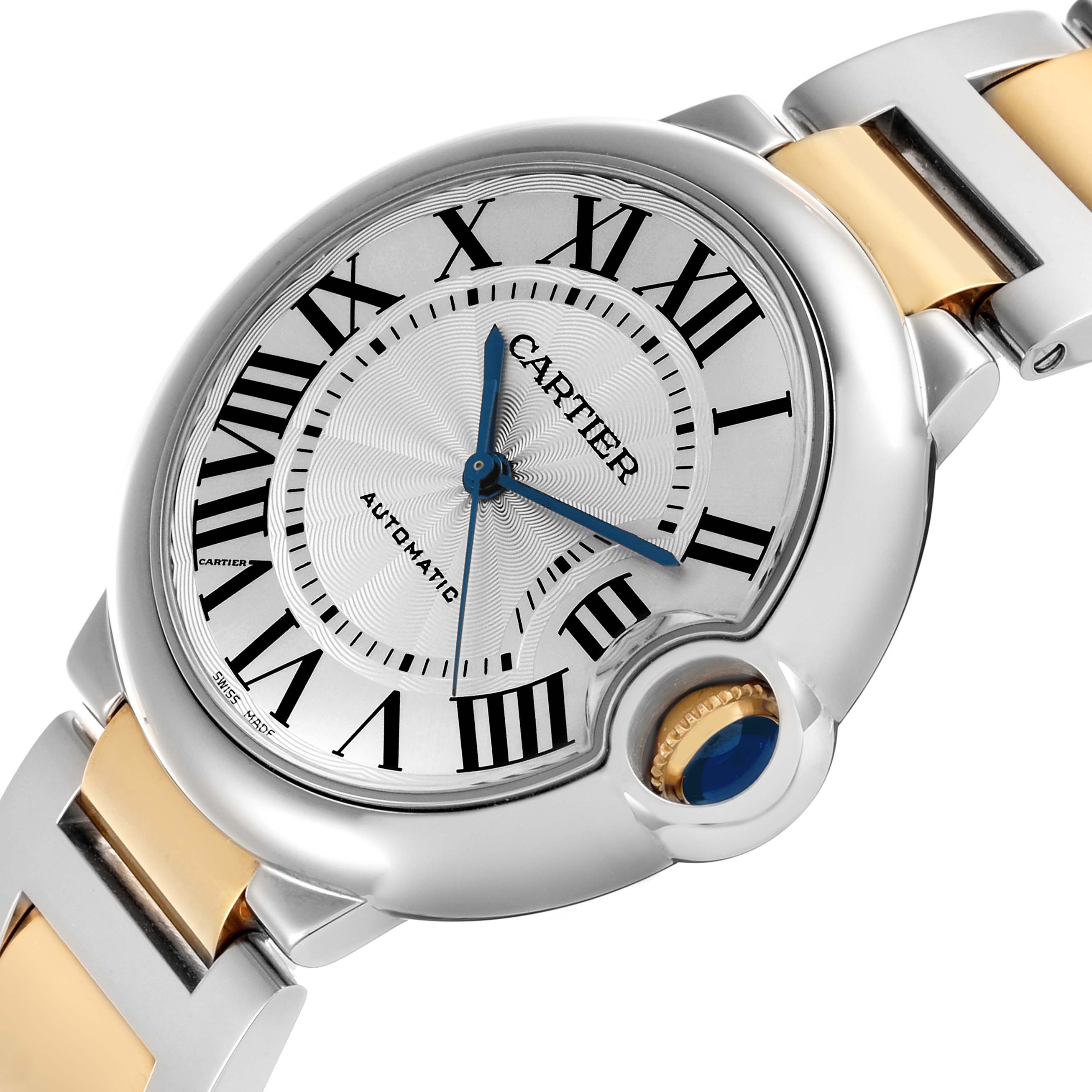 The Cartier Ballon Bleu W2BB0012 Women's Steel and Gold (two tone) Silver Dial W2BB0012 Women's Steel and Gold (two tone) Silver Dial watch is shown at an angle highlighting the face, crown, and part of the bracelet.