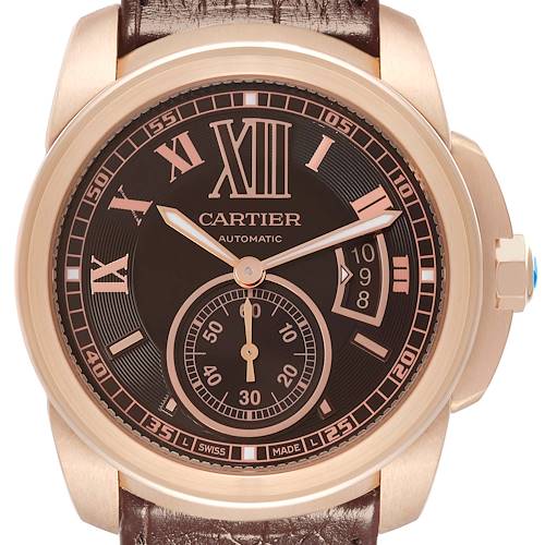 The image shows a frontal view of a Cartier Calibre de Cartier model W7100007 men's watch, displaying the dial, case, and part of the leather strap.