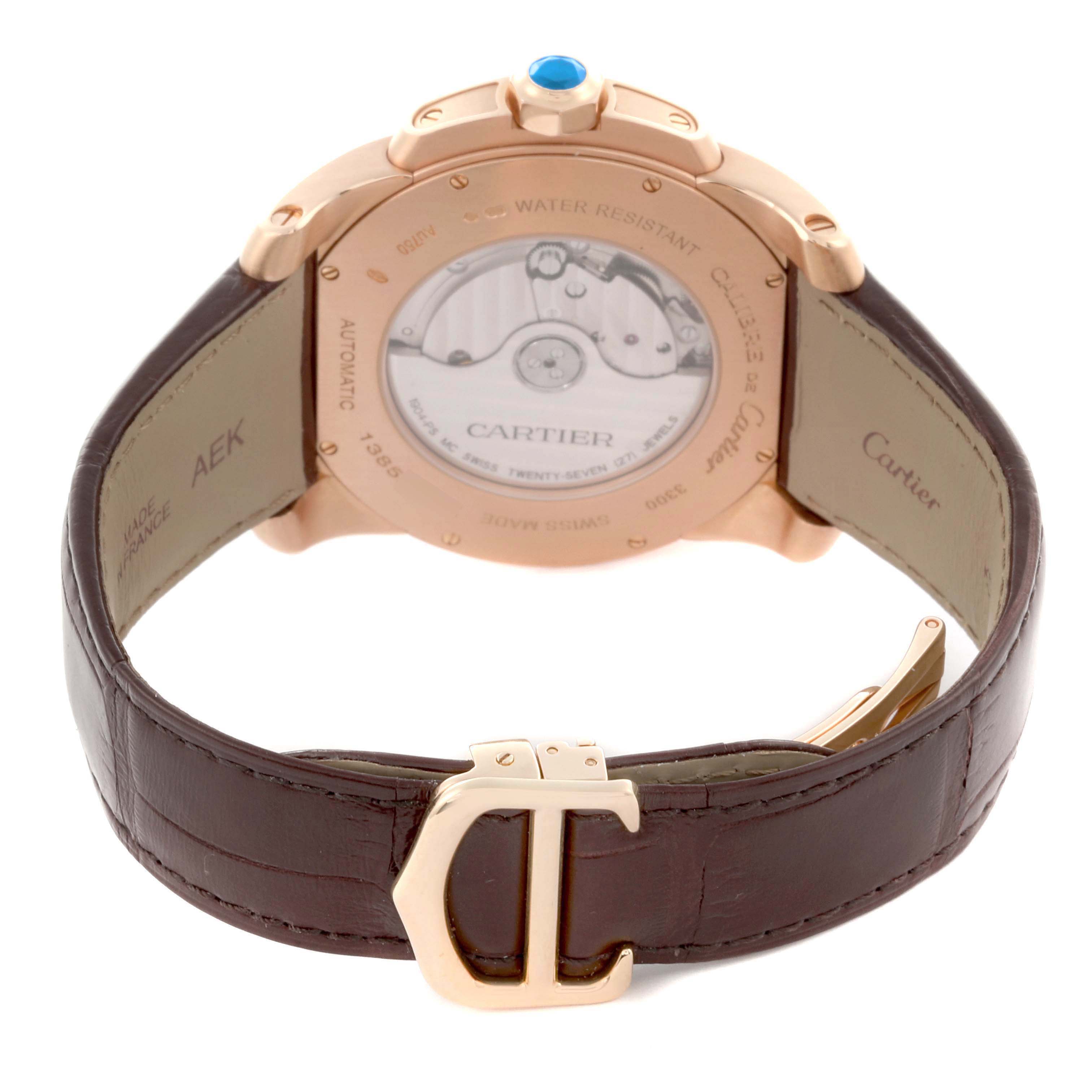 The image shows the back of the Cartier Calibre de Cartier, model number W7100007, focusing on the case back, strap, and clasp from a rear angle.