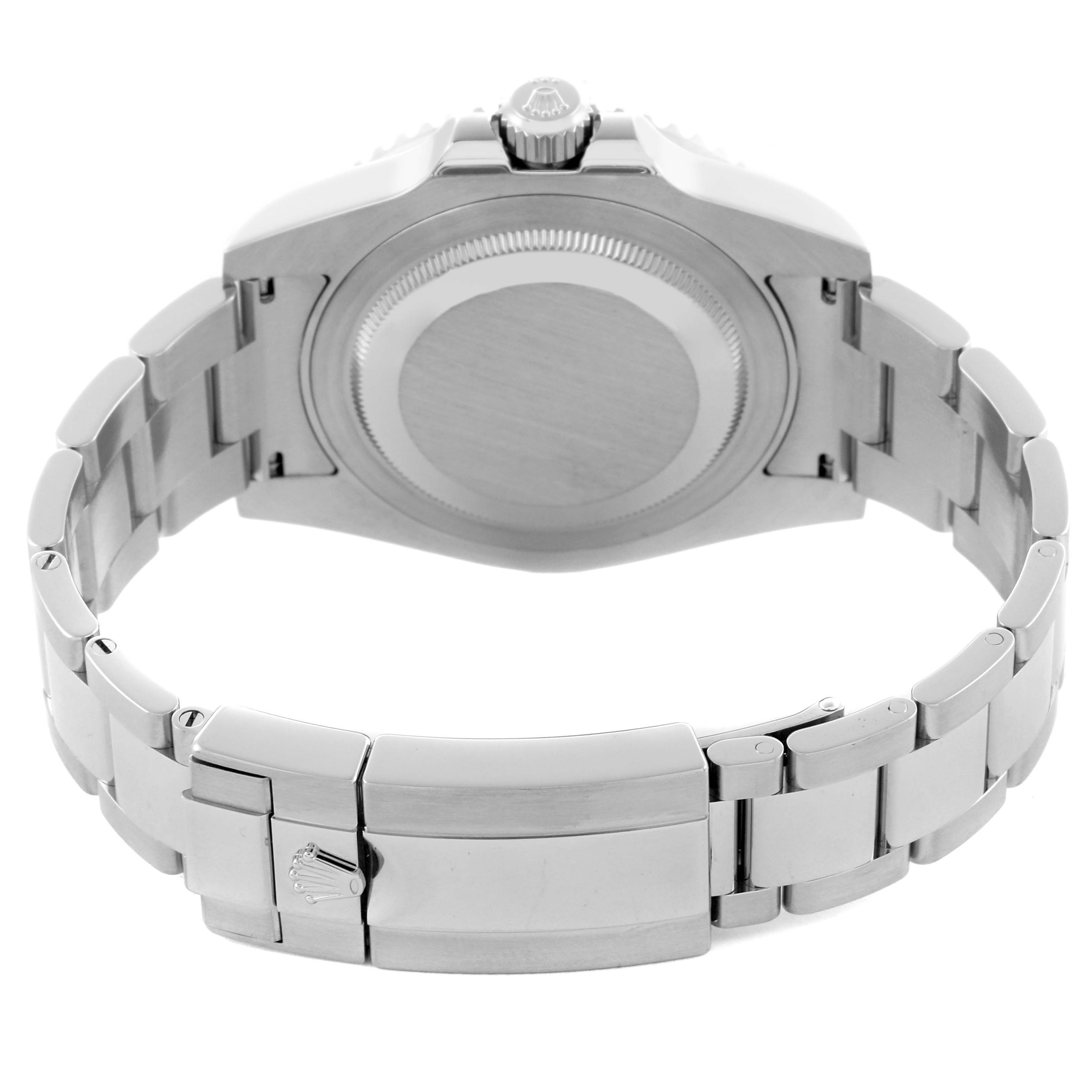 The Rolex GMT-Master 116710BLNR Men's Stainless Steel Black Dial 116710BLNR Men's Stainless Steel Black Dial watch is shown from the back, highlighting the case back and bracelet clasp.