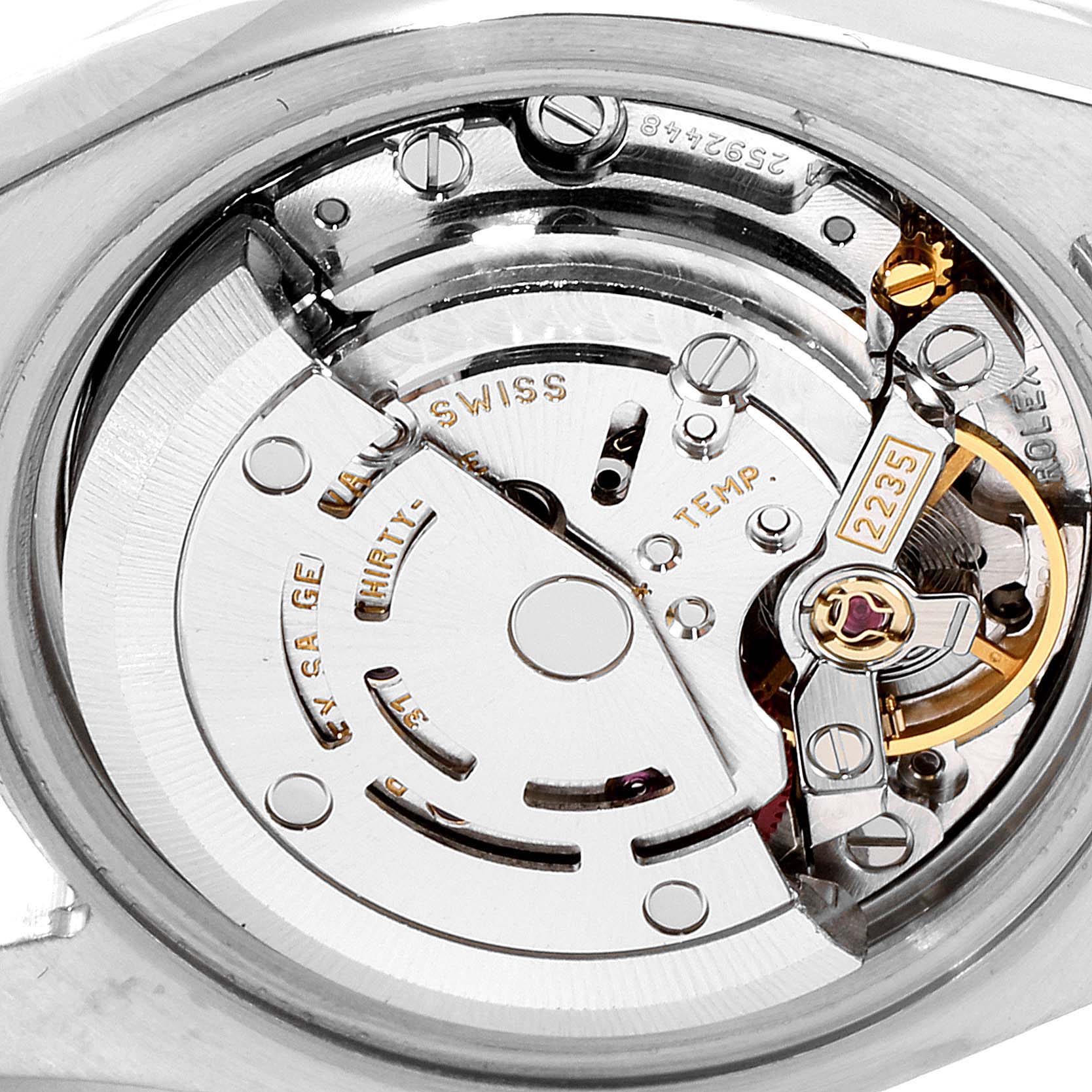 The image shows a close-up of the movement mechanism inside a Rolex Datejust 179173 Women's Steel and Gold (two tone) Champagne Dial 179173 Women's Steel and Gold (two tone) Champagne Dial watch.