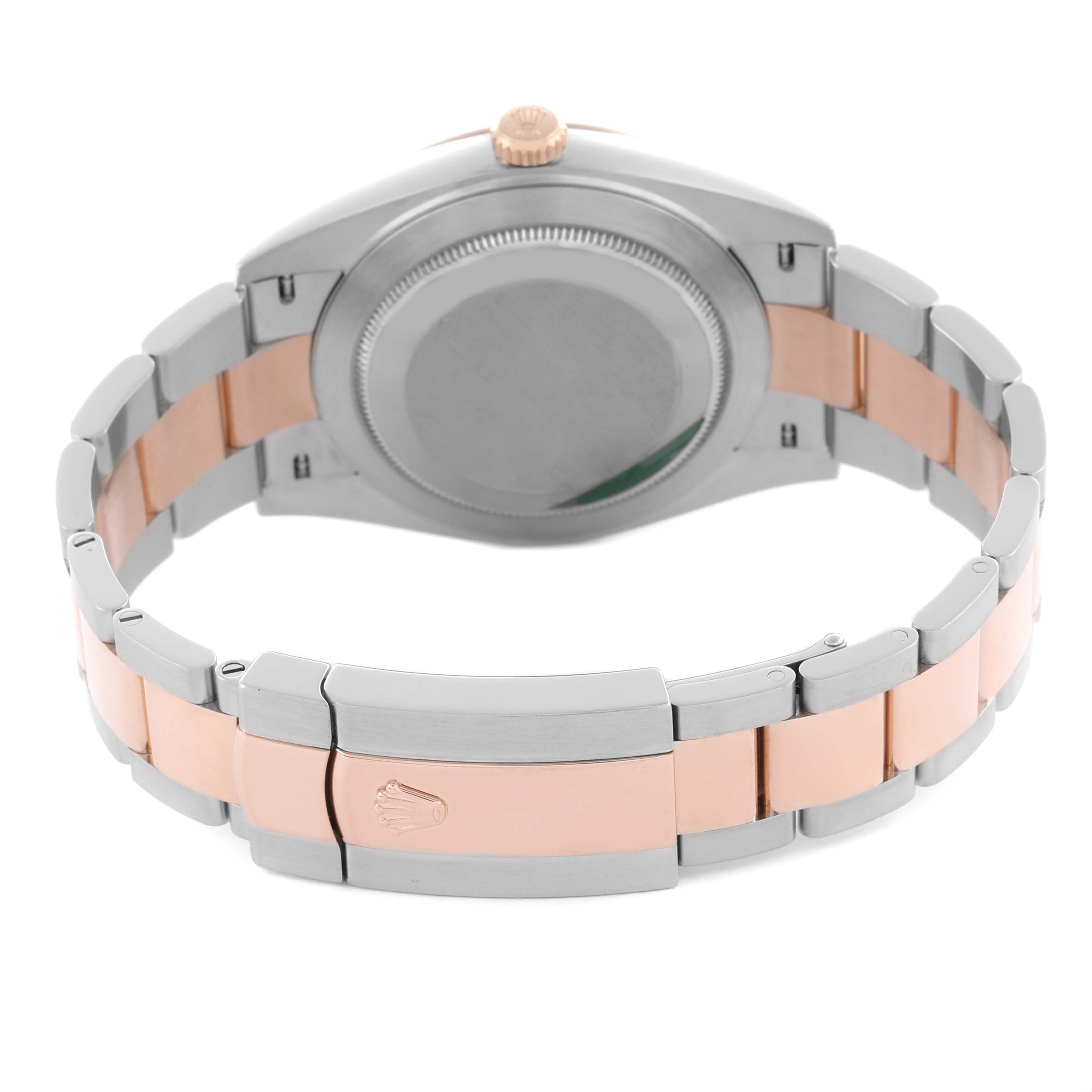 The image shows the back of a Rolex Datejust 41 126331 Men's Steel and Gold (two tone) Brown Dial 126331 Men's Steel and Gold (two tone) Brown Dial, highlighting the caseback, two-tone bracelet, and clasp.