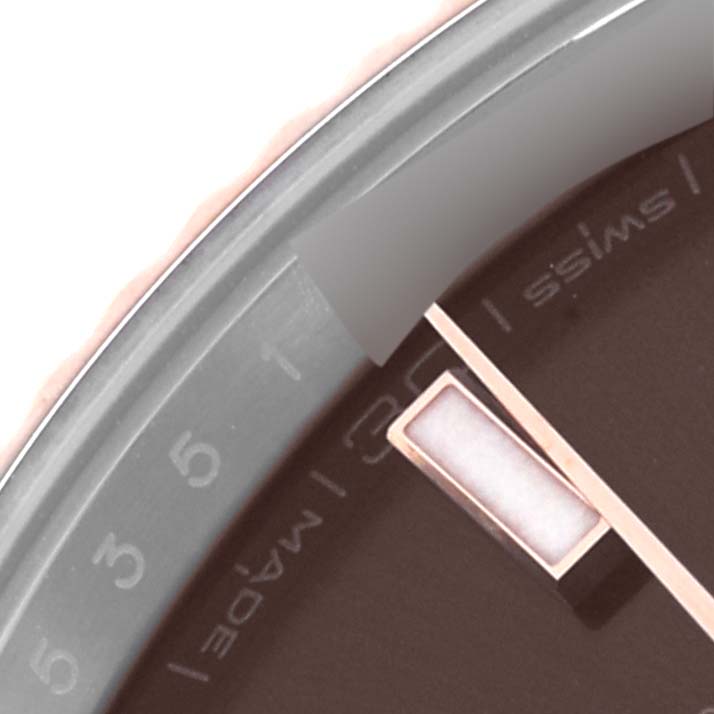 The image shows a close-up of the dial and bezel edge of the Rolex Datejust 41 126331 Men's Steel and Gold (two tone) Brown Dial 126331 Men's Steel and Gold (two tone) Brown Dial.