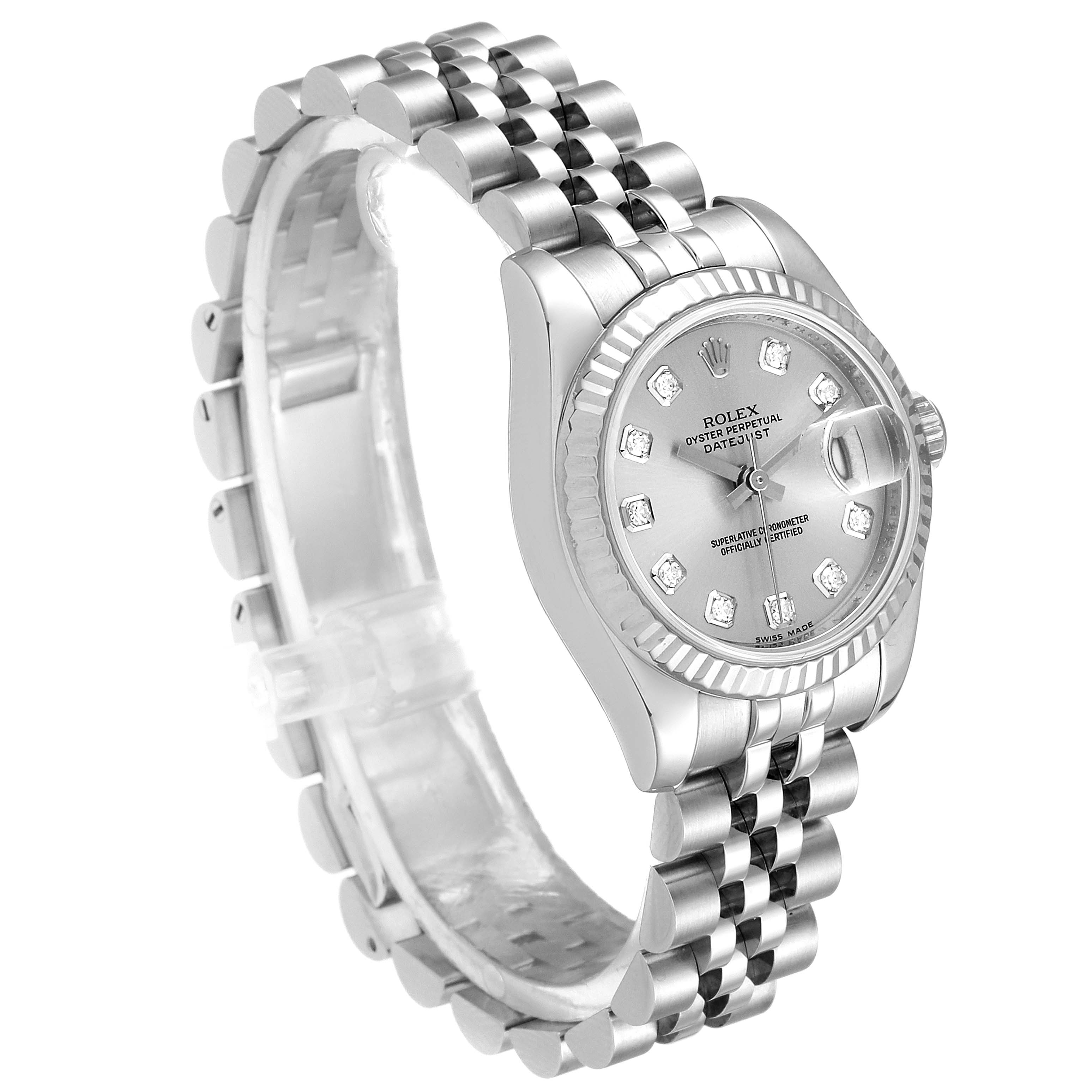 This Rolex Datejust 179174 Women's Stainless Steel Silver Dial 179174 Women's Stainless Steel Silver Dial watch is shown from a three-quarter angle, highlighting its bracelet, case, dial, and bezel.