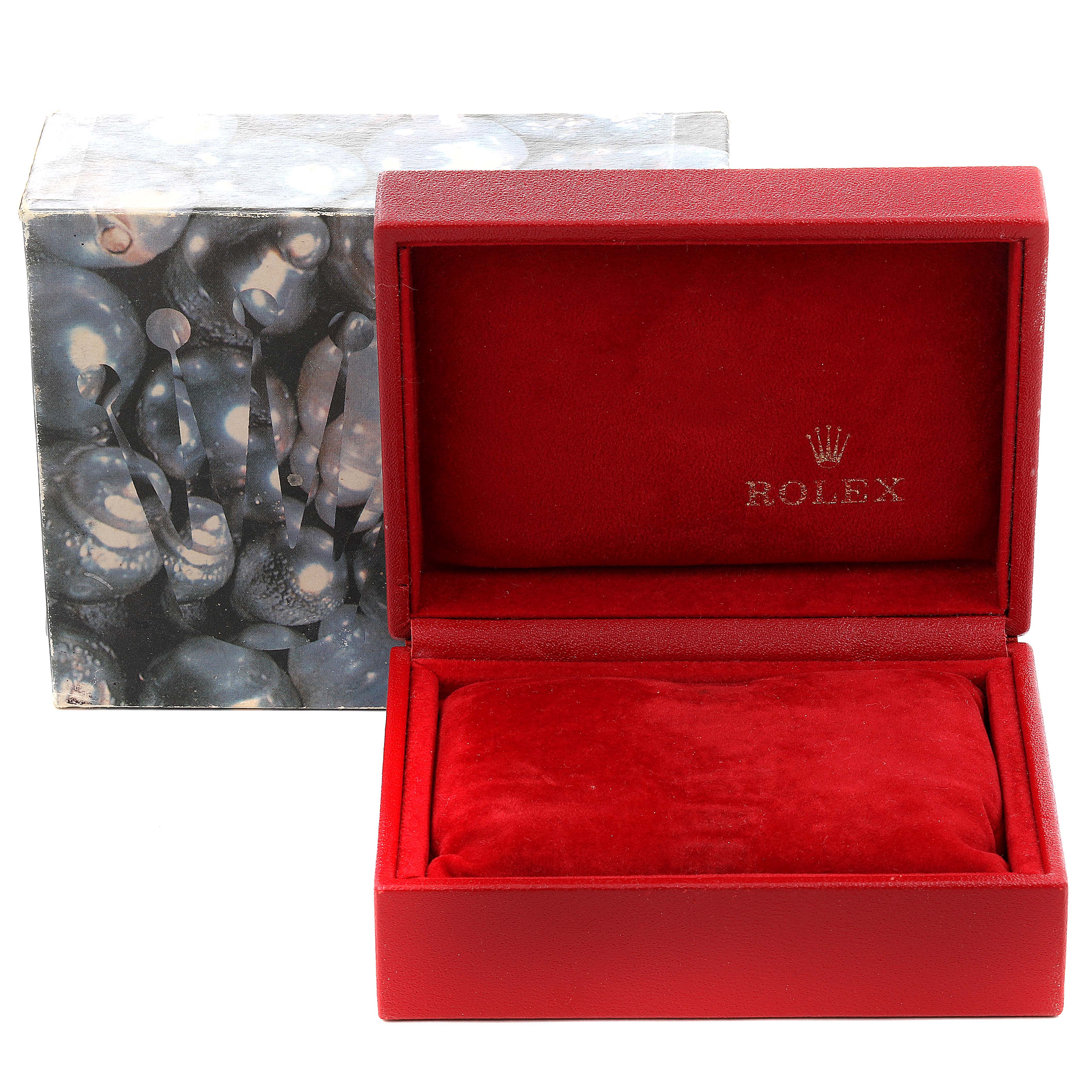 This image shows the open red watch box and outer box of a Rolex Datejust 69173 Women's Steel and Gold (two tone) Silver Dial 69173 Women's Steel and Gold (two tone) Silver Dial model.