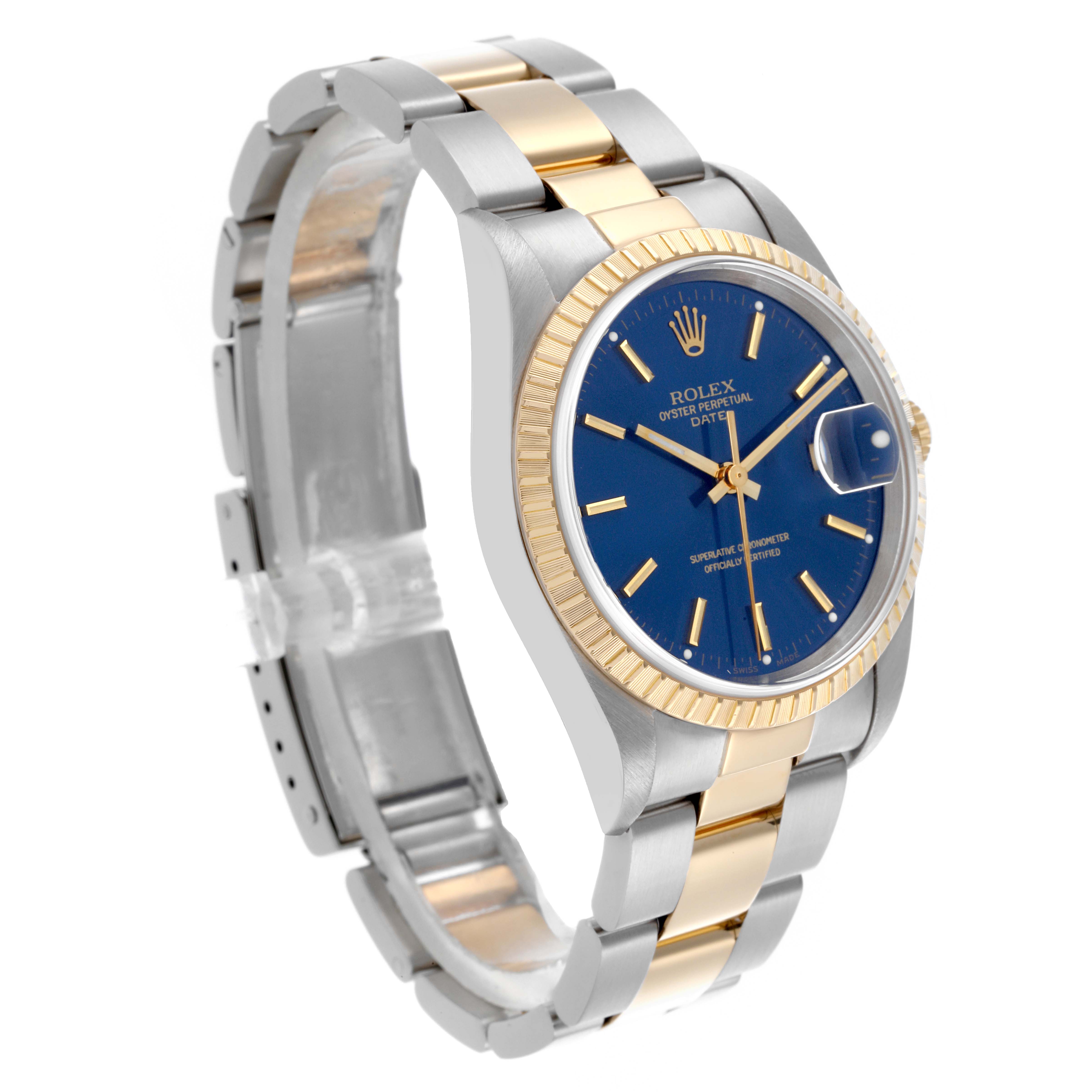 The Rolex Date 15223 Men's Steel and Gold (two tone) Blue Dial 15223 Men's Steel and Gold (two tone) Blue Dial watch is shown from a side and slightly angled view, highlighting the gold and silver bracelet, blue dial, and fluted bezel.
