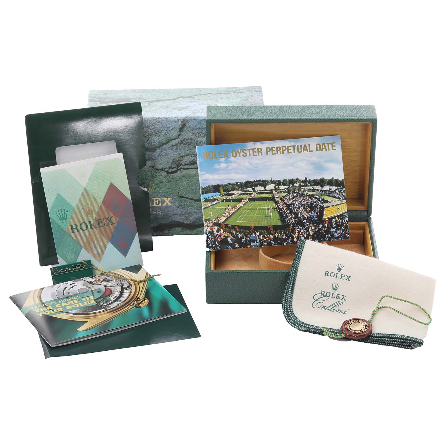 The image shows Rolex Date 15223 Men's Steel and Gold (two tone) Blue Dial 15223 Men's Steel and Gold (two tone) Blue Dial watch accessories including a box, booklets, and tags from a top angle.