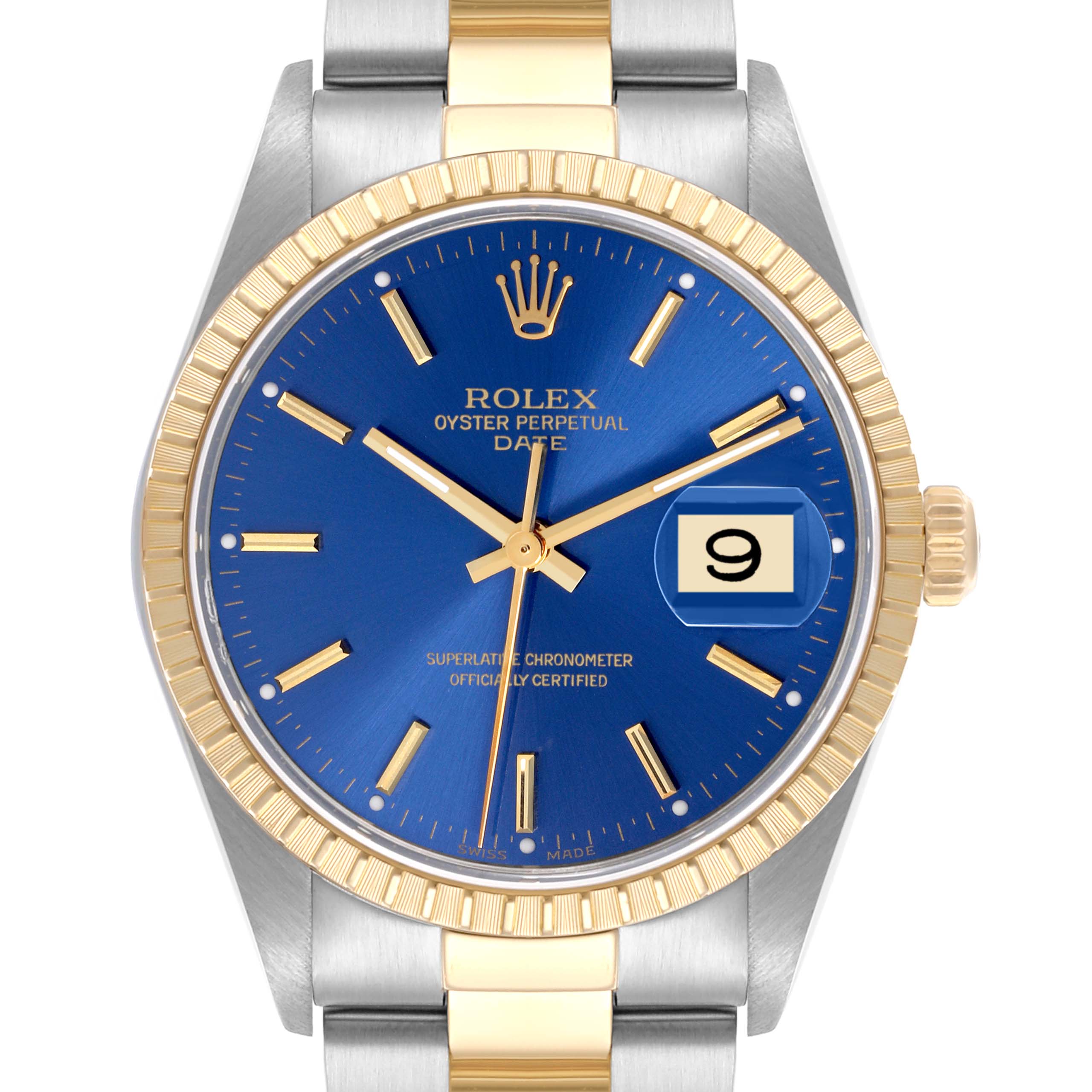 The Rolex Date 15223 Men's Steel and Gold (two tone) Blue Dial 15223 Men's Steel and Gold (two tone) Blue Dial watch is shown from a front angle, displaying the blue dial, gold bezel, and part of the two-tone bracelet.