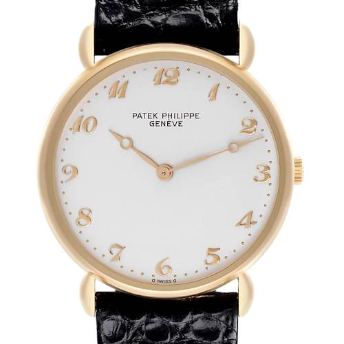 The Patek Philippe Calatrava Men's Yellow Gold Silver Dial Men's Yellow Gold Silver Dial watch is shown in a front view, highlighting the dial, hands, and leather strap.