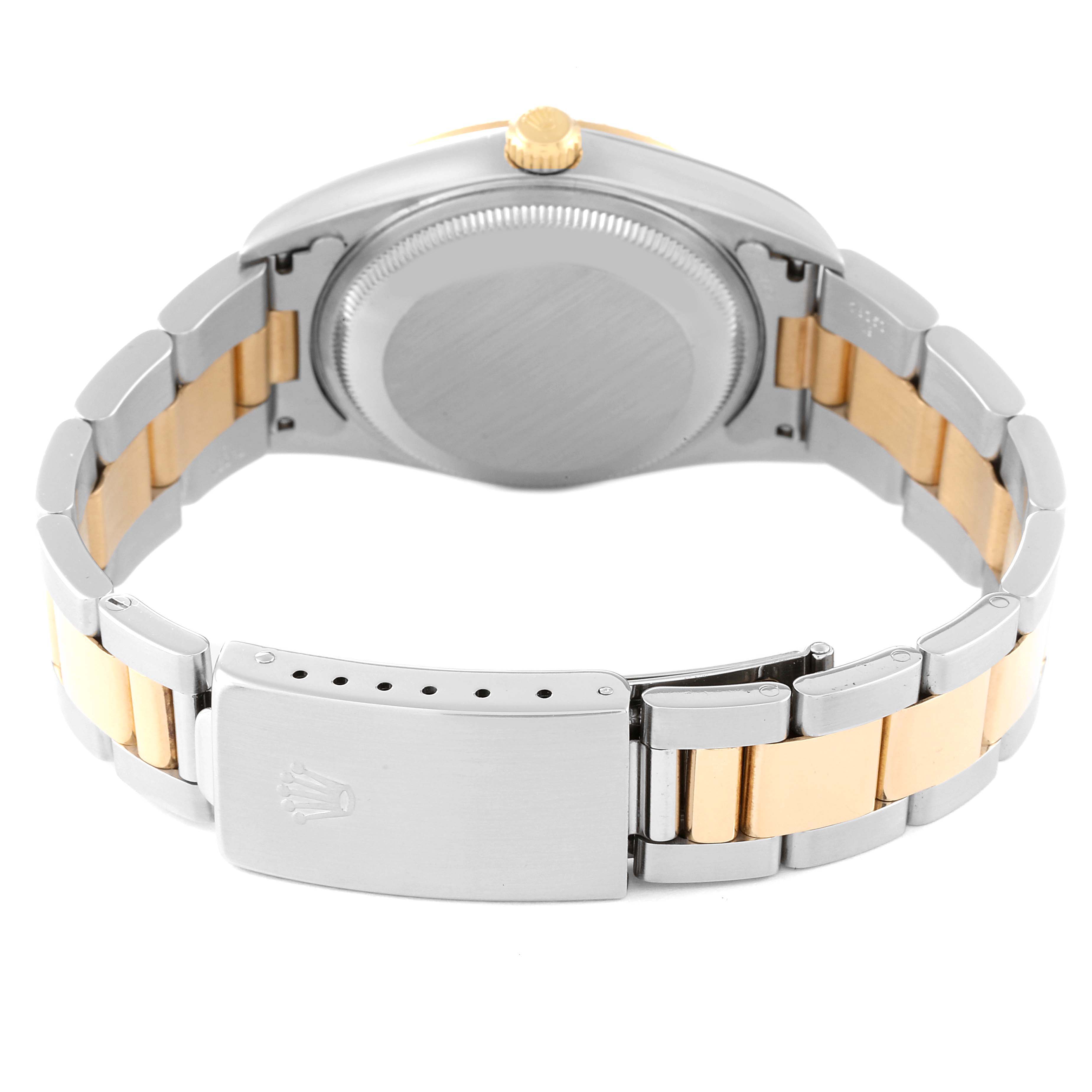 This image shows the back view of a Rolex Date 15223 Men's Steel and Gold (two tone) Champagne Dial 15223 Men's Steel and Gold (two tone) Champagne Dial model watch, highlighting the stainless steel and gold bracelet and clasp.