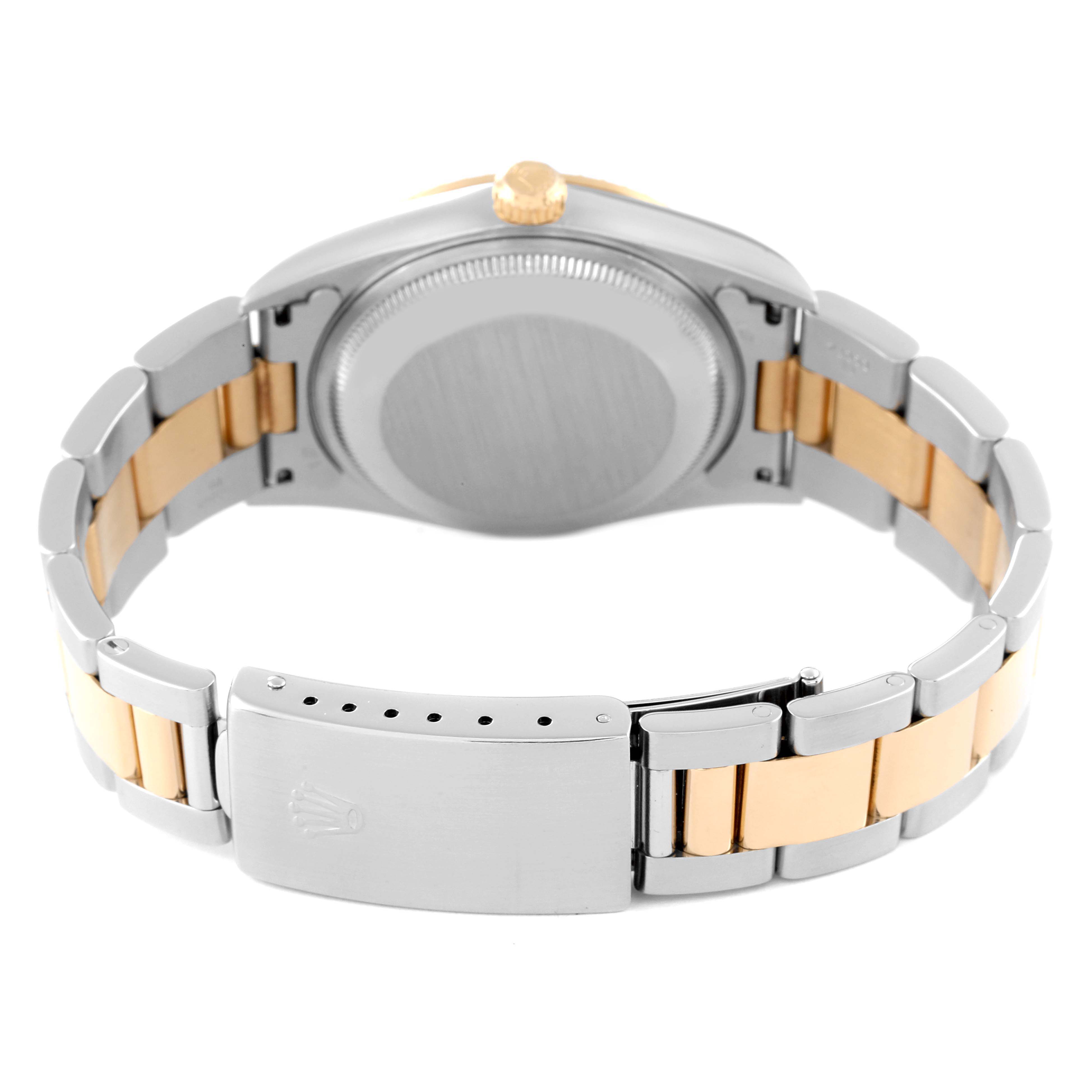 This image shows the back view of a Rolex Date 15223 Men's Steel and Gold (two tone) Champagne Dial 15223 Men's Steel and Gold (two tone) Champagne Dial model watch, displaying the caseback and bracelet with the clasp.