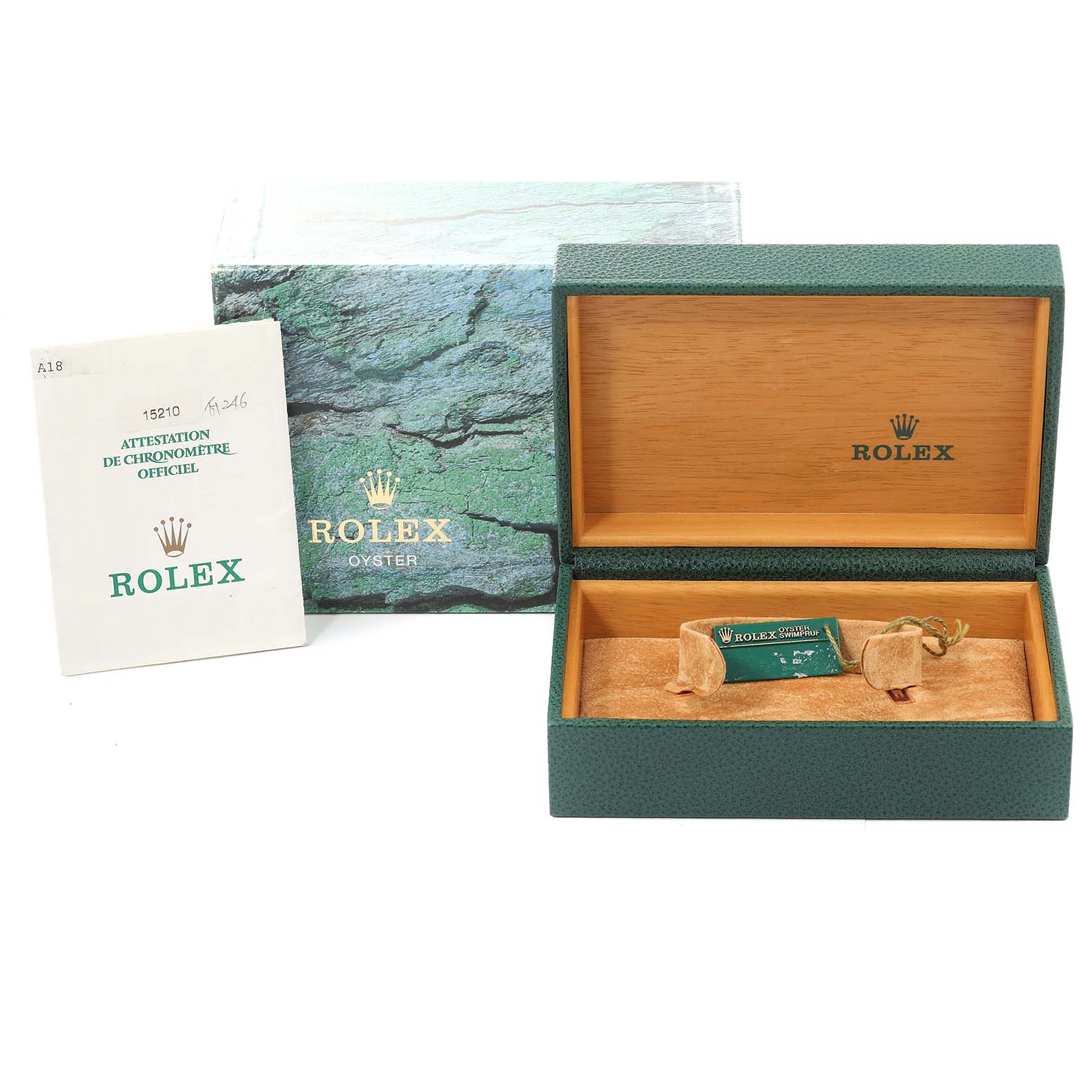 The image shows the packaging, box, and certification booklet for a Rolex Date 15210 Men's Stainless Steel White Dial 15210 Men's Stainless Steel White Dial model watch.