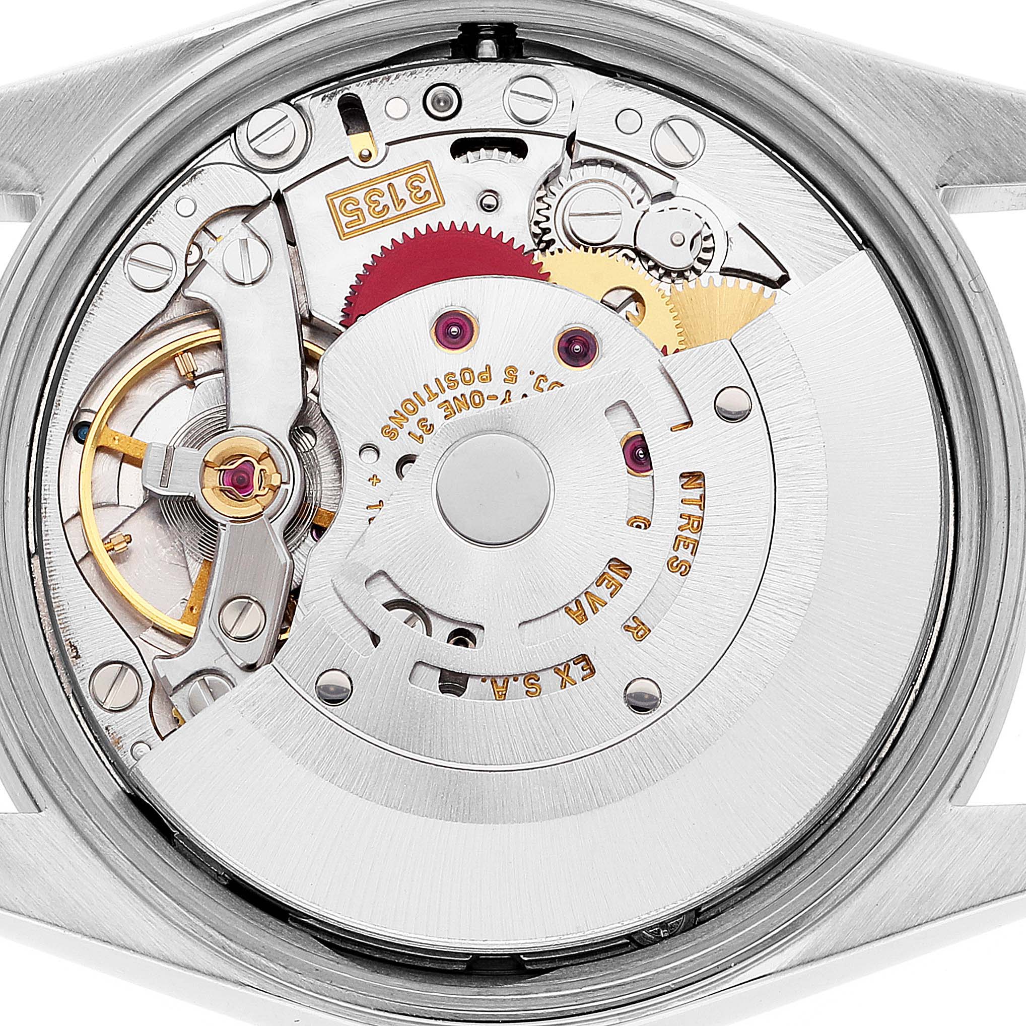 This image shows the back view of a Rolex Date 15210 Men's Stainless Steel White Dial 15210 Men's Stainless Steel White Dial model watch, highlighting its intricate mechanical movement and rotor.