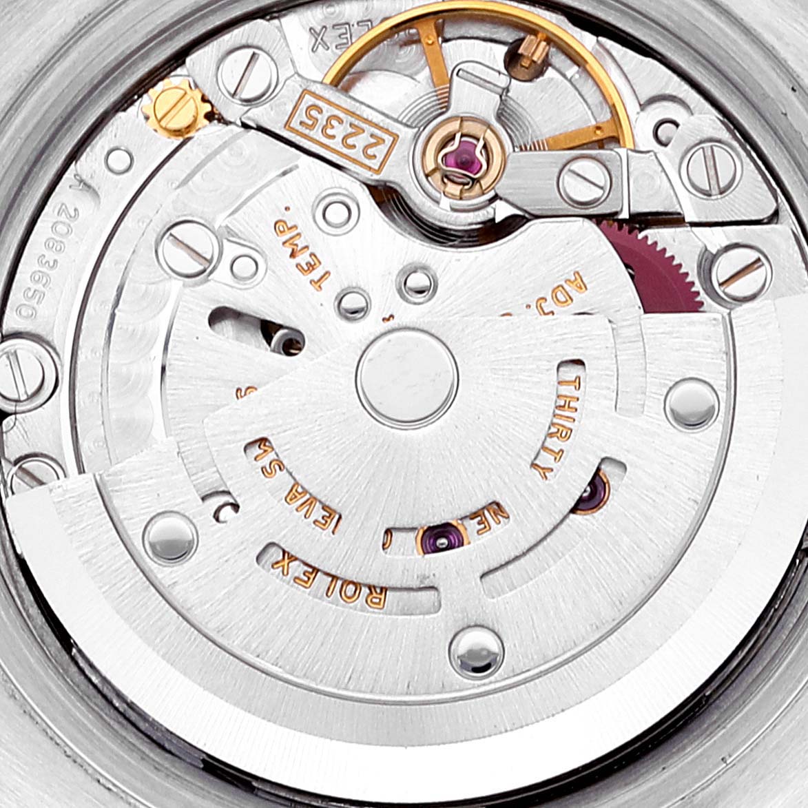 This image shows a close-up view of the movement mechanism of the Rolex Datejust 179174 Women's Stainless Steel Black Dial 179174 Women's Stainless Steel Black Dial watch.