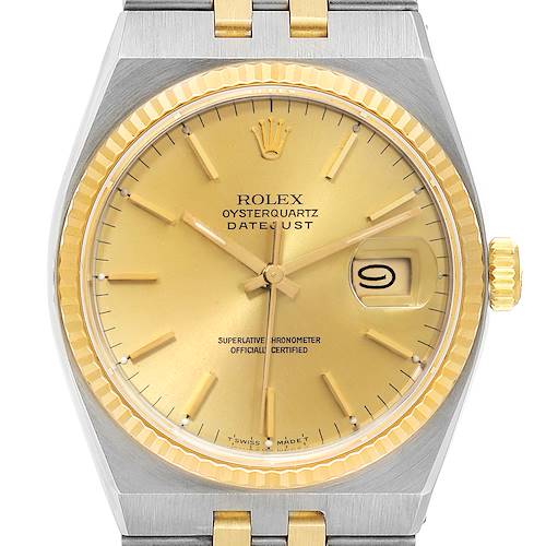 The image shows a front view of the Rolex Oysterquartz 17013 Men's Steel and Gold (two tone) Champagne Dial 17013 Men's Steel and Gold (two tone) Champagne Dial Datejust watch, highlighting its gold dial, fluted bezel, and two-tone bracelet.