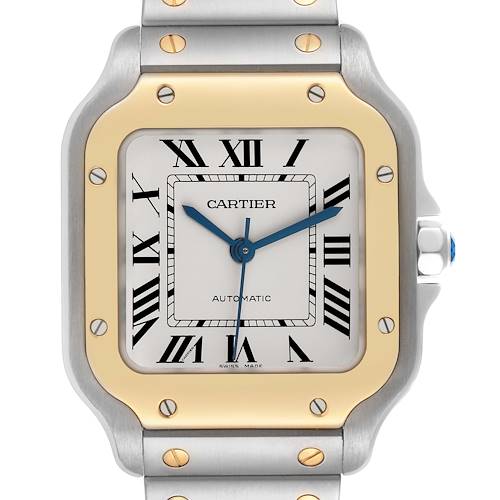 The Cartier Santos W2SA0007 Men's Steel and Gold (two tone) Silver Dial W2SA0007 Men's Steel and Gold (two tone) Silver Dial watch is shown from the front, highlighting the dial, bezel, and part of the bracelet.