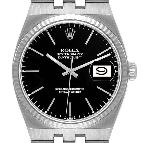 The image shows a frontal view of a Rolex Oysterquartz 17014 Men's Stainless Steel Black Dial 17014 Men's Stainless Steel Black Dial Datejust watch, highlighting its black dial, fluted bezel, and date window.