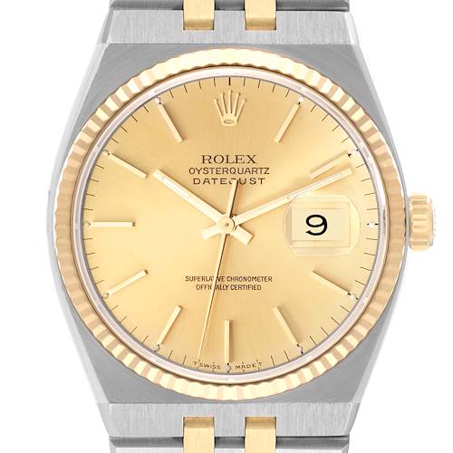 This image shows a frontal view of a Rolex Oysterquartz 17013 Men's Steel and Gold (two tone) Champagne Dial 17013 Men's Steel and Gold (two tone) Champagne Dial Datejust watch, displaying the dial, bezel, and part of the bracelet.