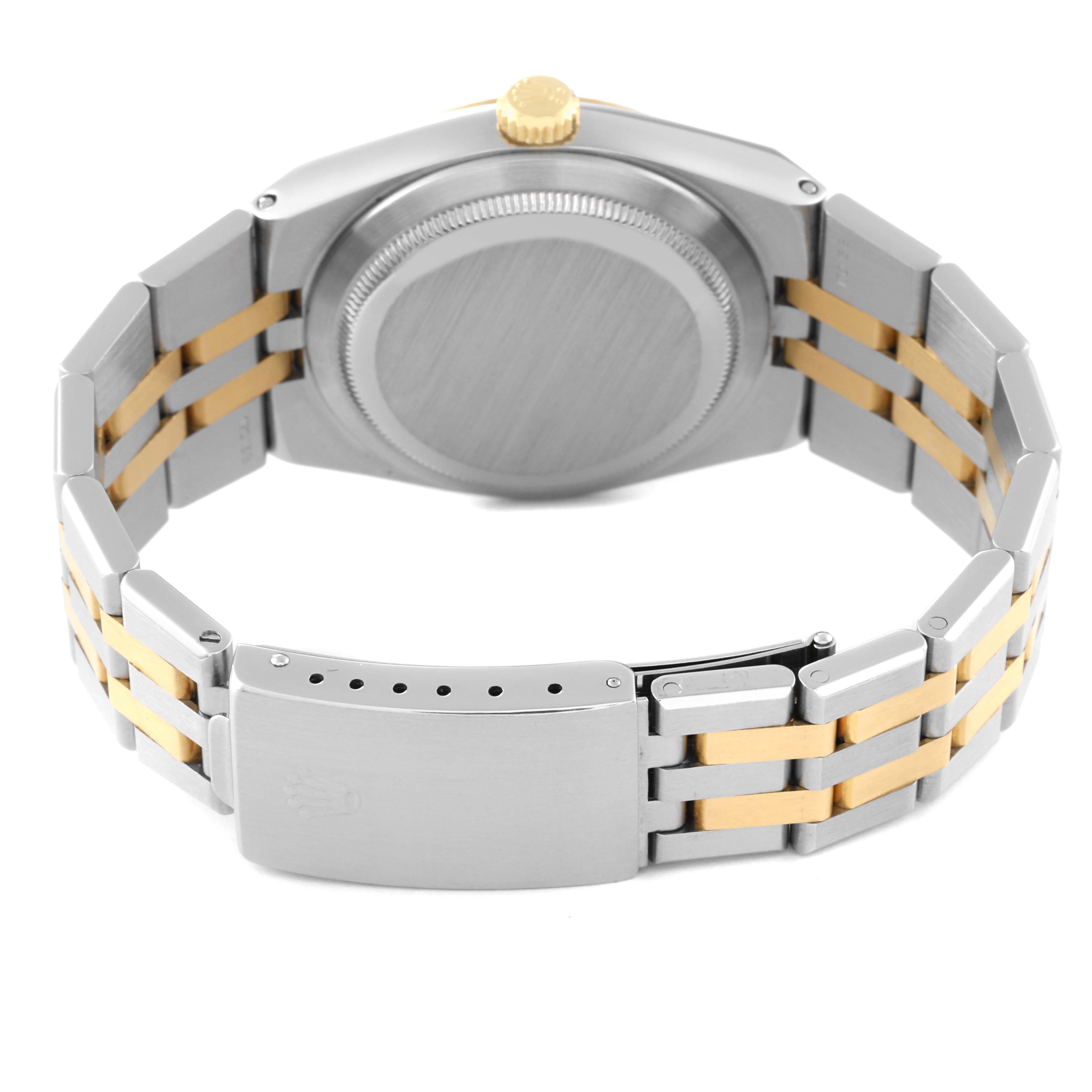 This image shows the back view of a Rolex Oysterquartz 17013 Men's Steel and Gold (two tone) Champagne Dial 17013 Men's Steel and Gold (two tone) Champagne Dial watch, highlighting the case back, crown, and two-tone bracelet with clasp.