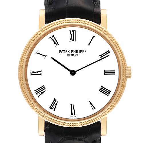 The image shows a front view of the Patek Philippe Calatrava 5120J Men's Yellow Gold White Dial 5120J Men's Yellow Gold White Dial watch, highlighting the dial, hands, bezel, and part of the strap.