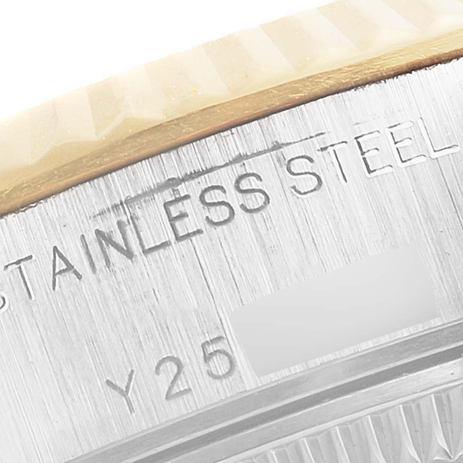 This close-up image shows the stainless steel part and reference engravings on the case back of a Rolex Datejust 79173 Women's Steel and Gold (two tone) Champagne Dial 79173 Women's Steel and Gold (two tone) Champagne Dial watch.