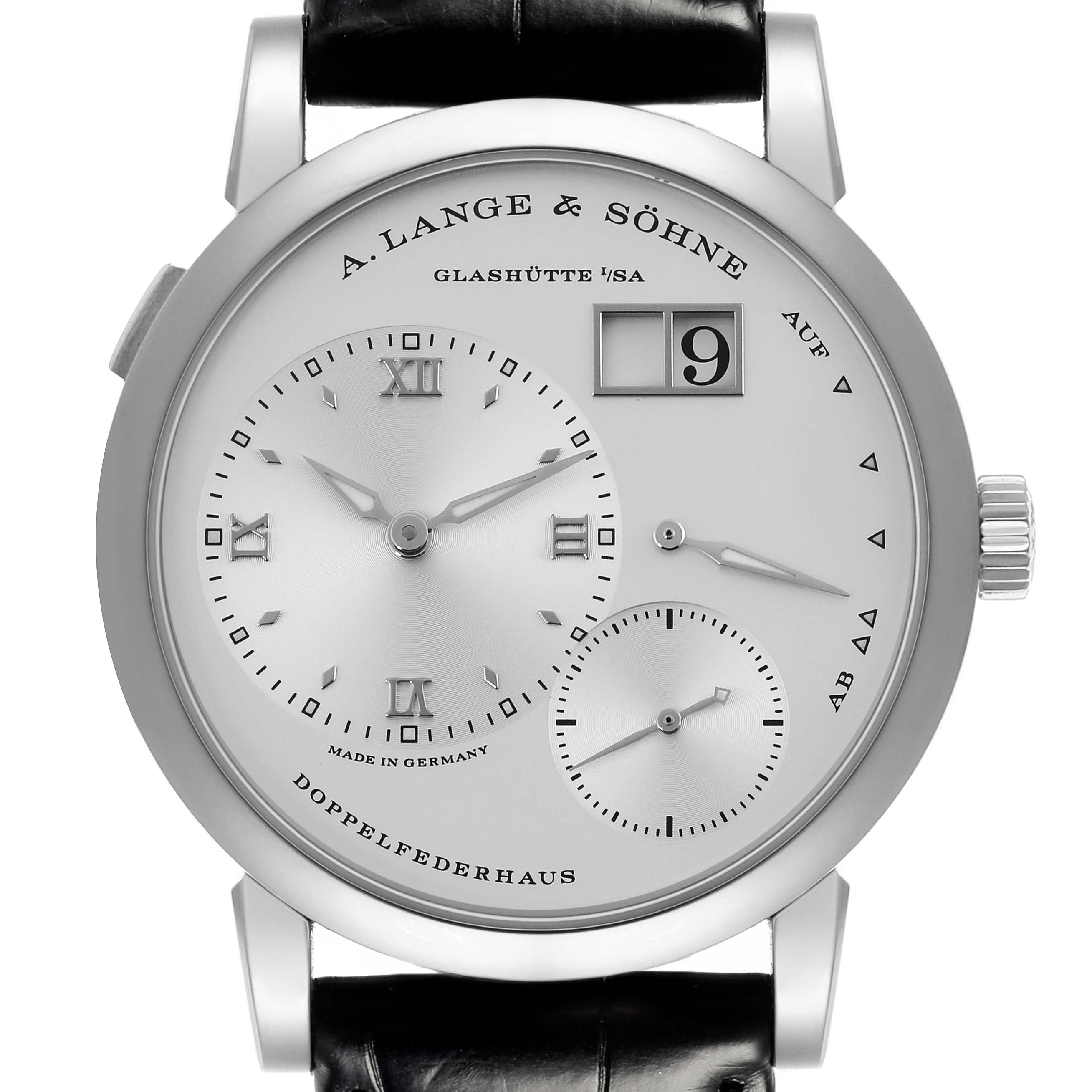 The Lange 1 by A. Lange & Söhne is shown from a front angle, displaying the face, dials, and crown clearly.