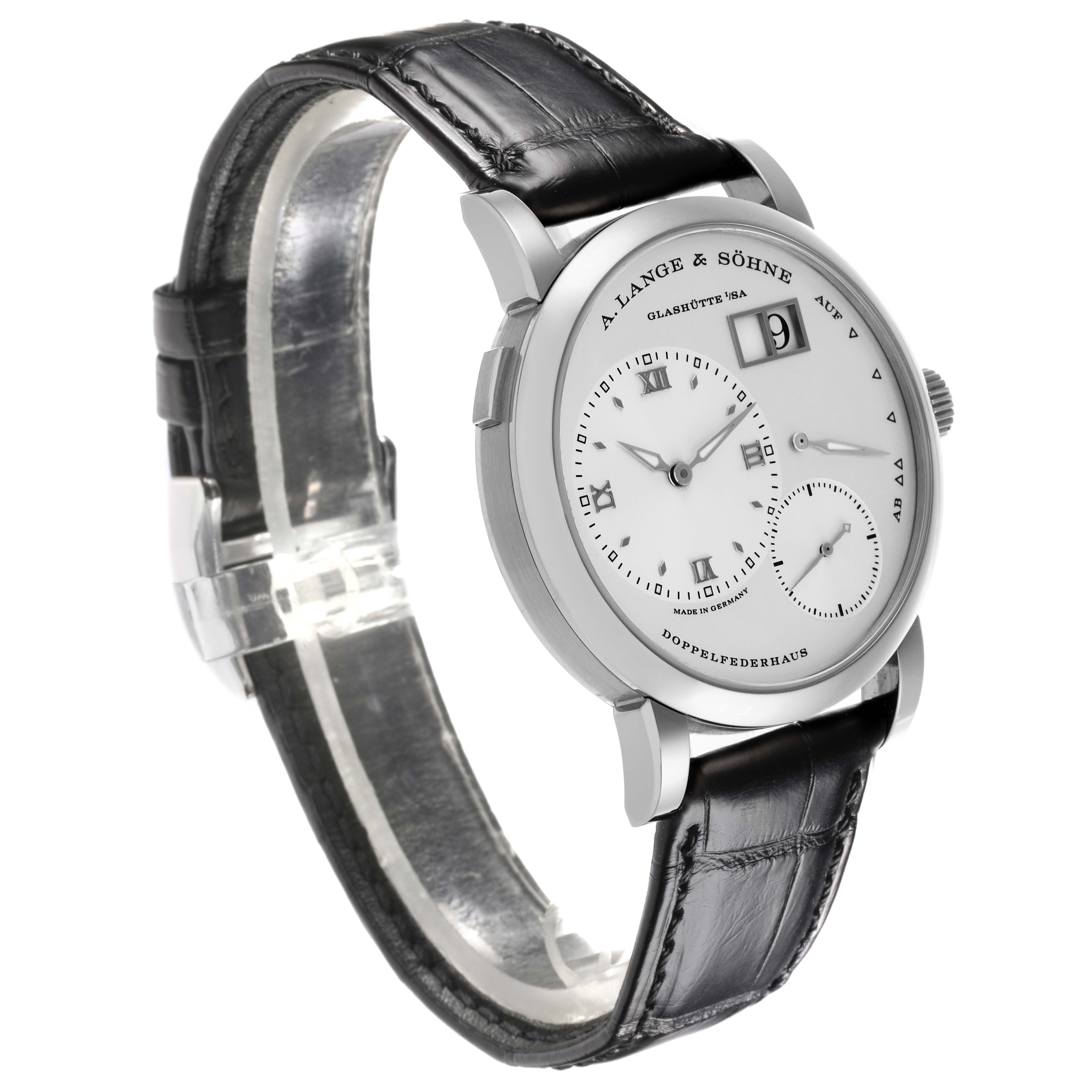 The Lange 1 model by A. Lange & Söhne is shown at a side angle, highlighting the face, lugs, and black leather strap.