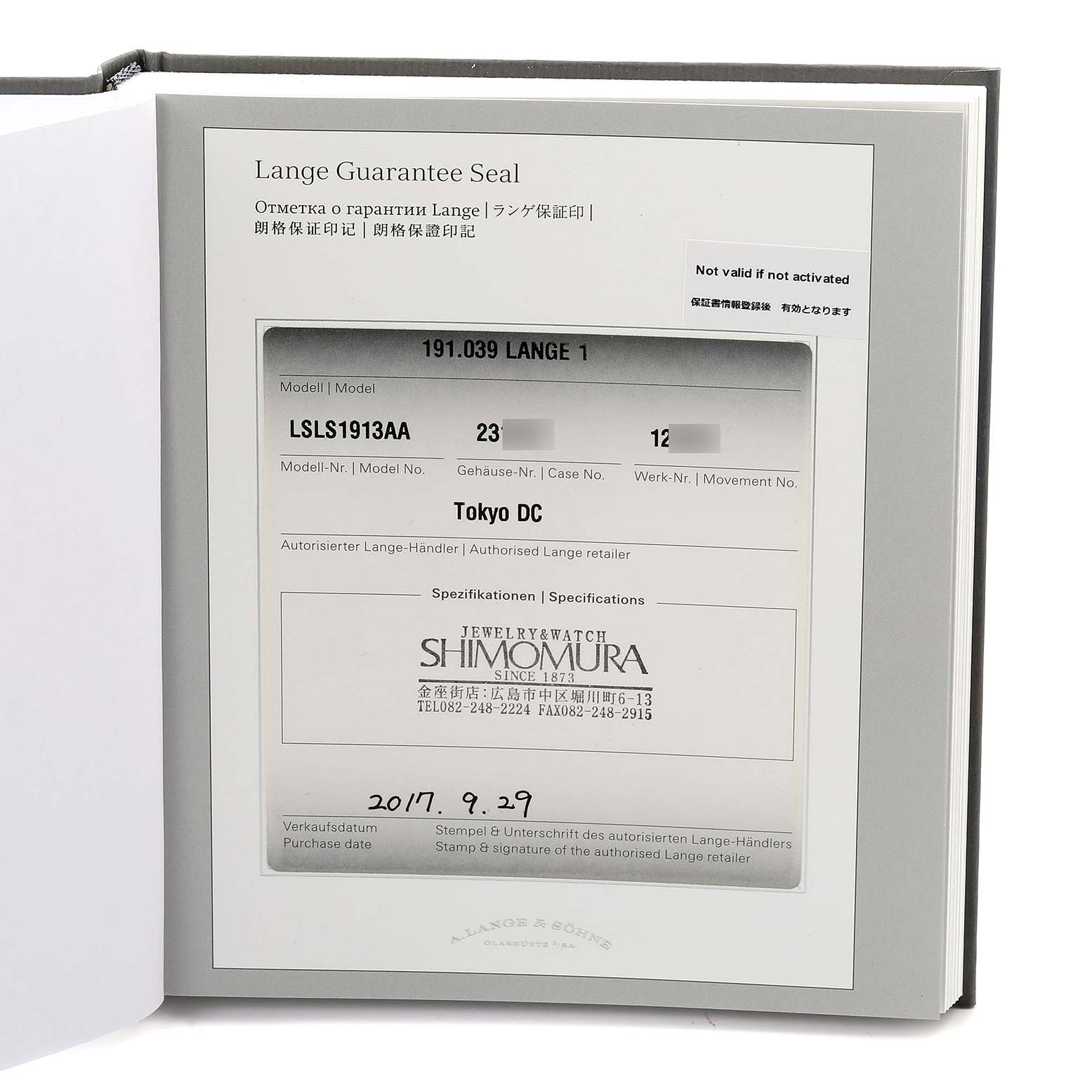 The image shows an A. Lange & Sohne Lange 1 191.039 Men's White Gold Silver Dial warranty booklet with details and retailer information.