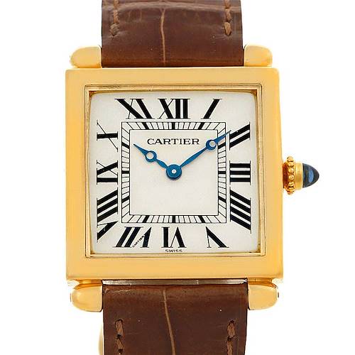 This image shows a Cartier Tank Obus Men's Yellow Gold Silver Dial Men's Yellow Gold Silver Dial watch from a front angle, highlighting its gold casing, Roman numerals, and brown leather strap.