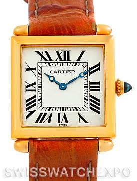 The image shows a frontal view of the Cartier Tank Obus Men's Yellow Gold Silver Dial Men's Yellow Gold Silver Dial watch, featuring its dial, hands, Roman numerals, crown, and strap.